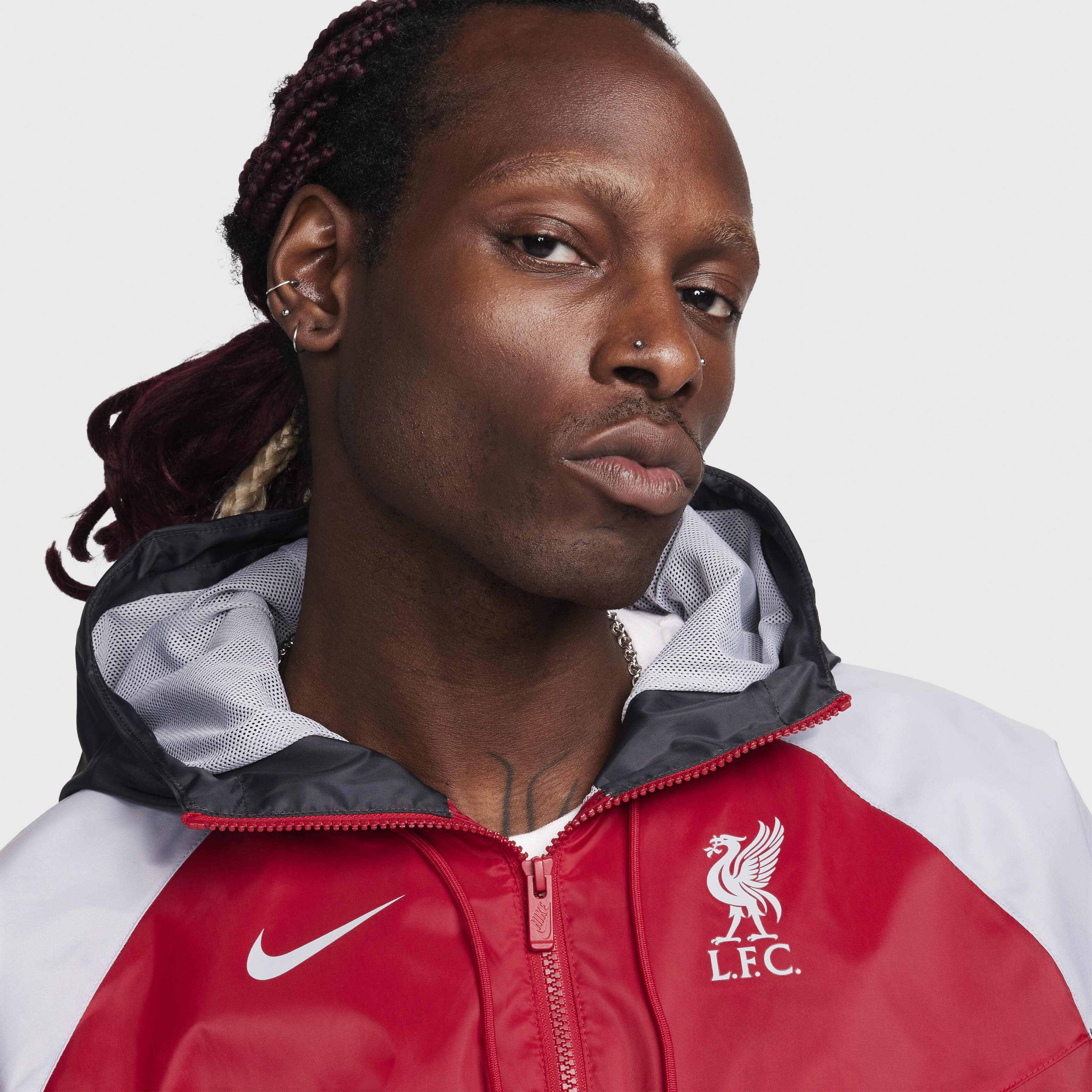 Buy Liverpool F.C. Sport Essentials Windrunner Men s Nike Football Hooded Woven Jacket Nike Qatar Official