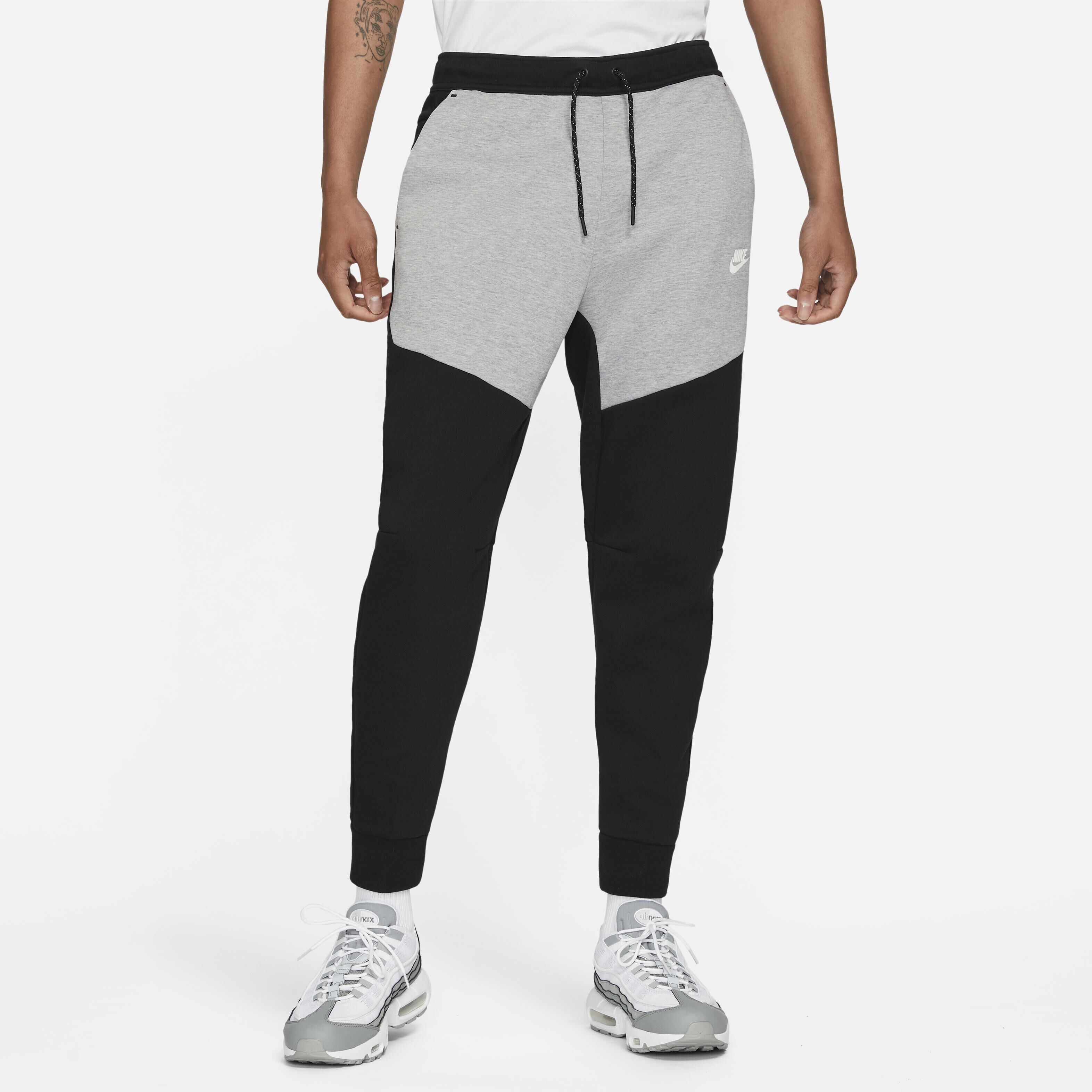 Black and grey nike tech bottoms hotsell