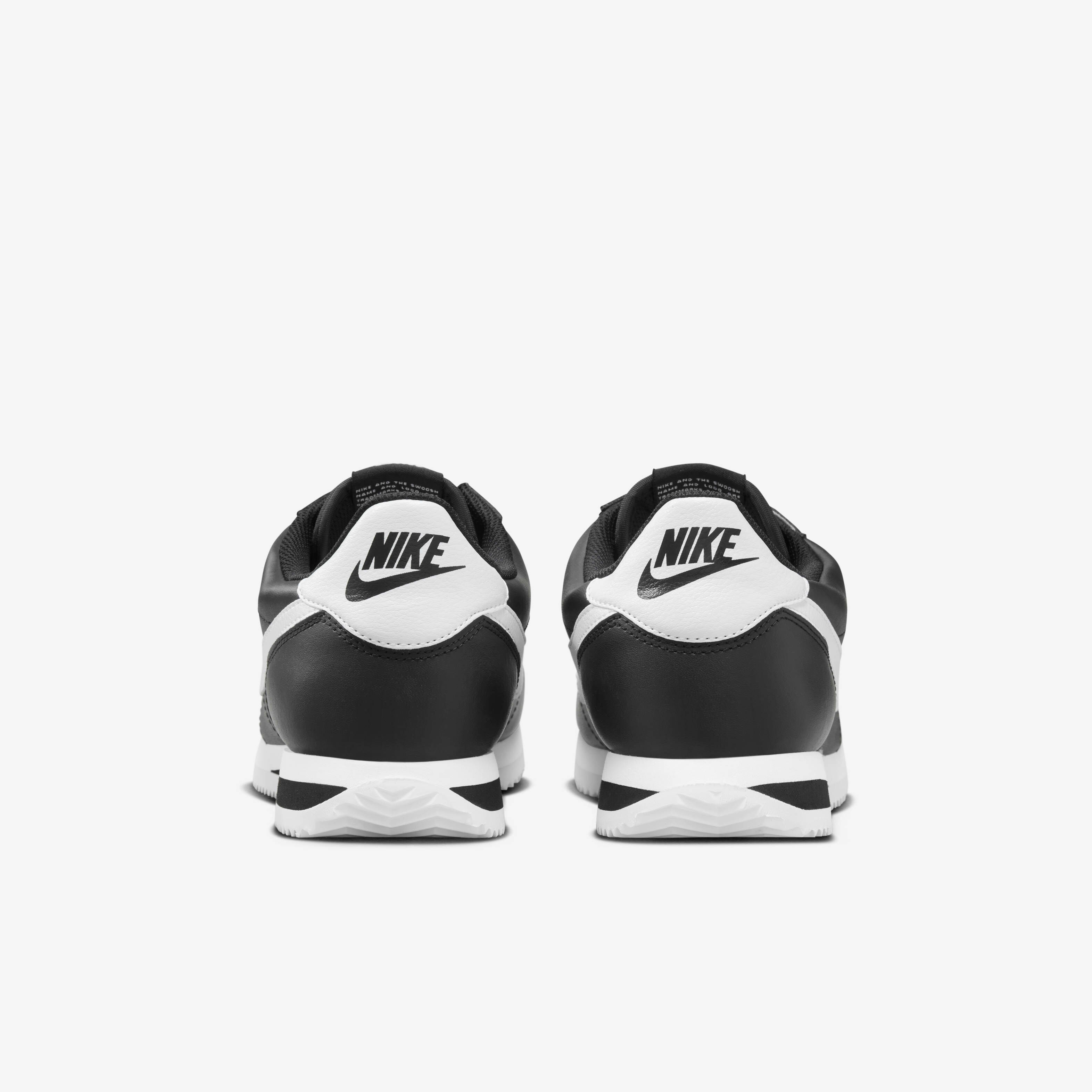 Nike cortez black and white leather top