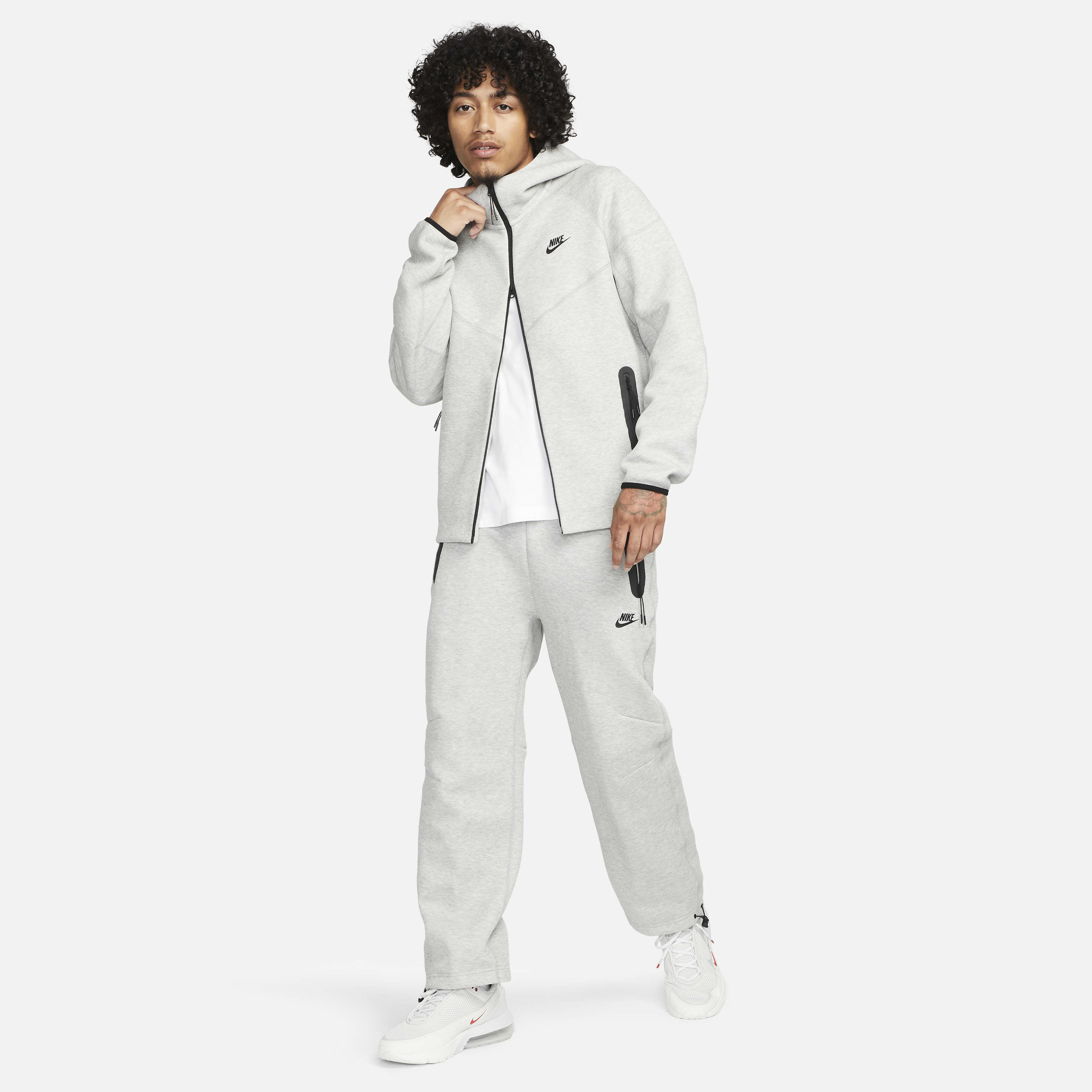 Nike sportswear fleece graphic tracksuit discount