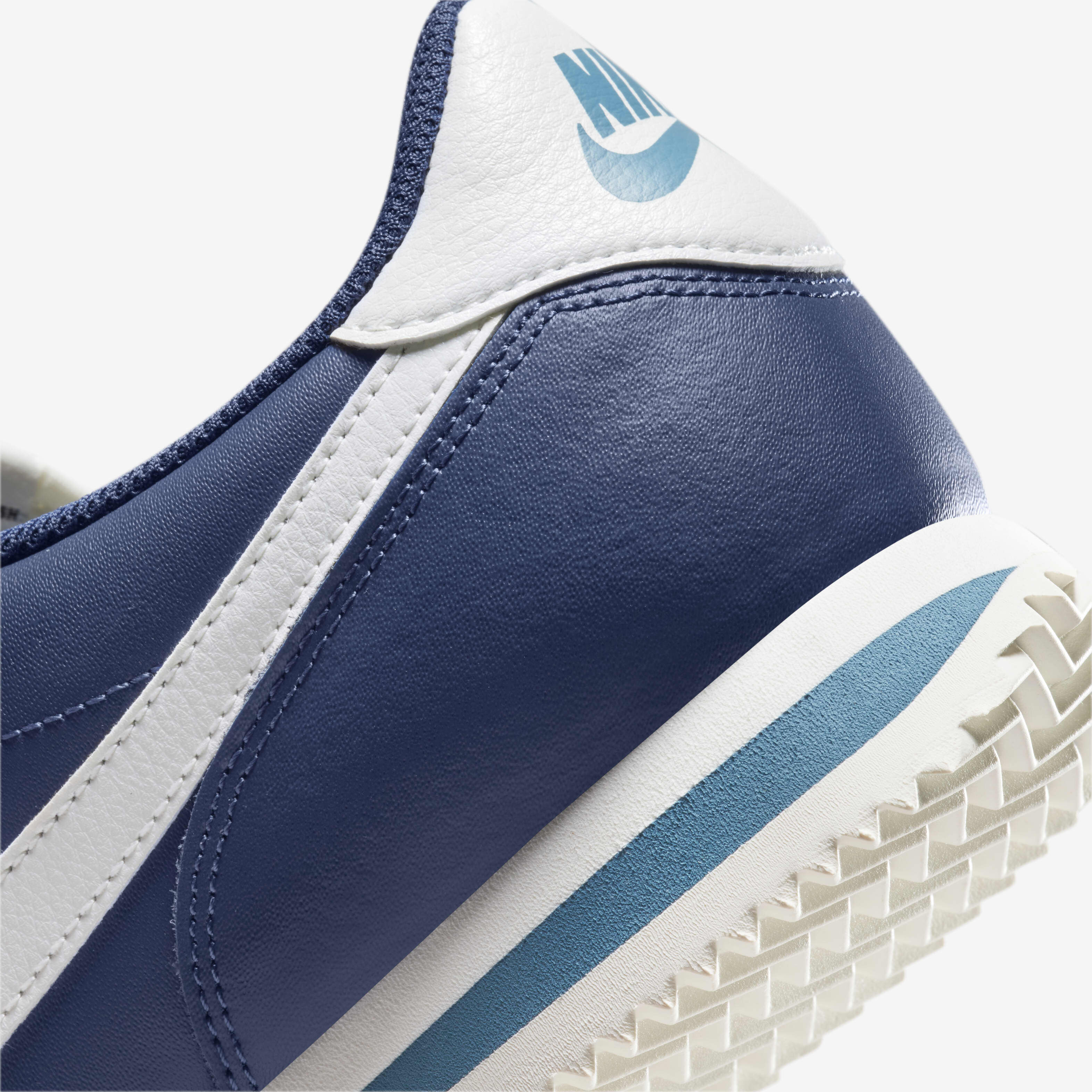 navy blue leather nike cortez