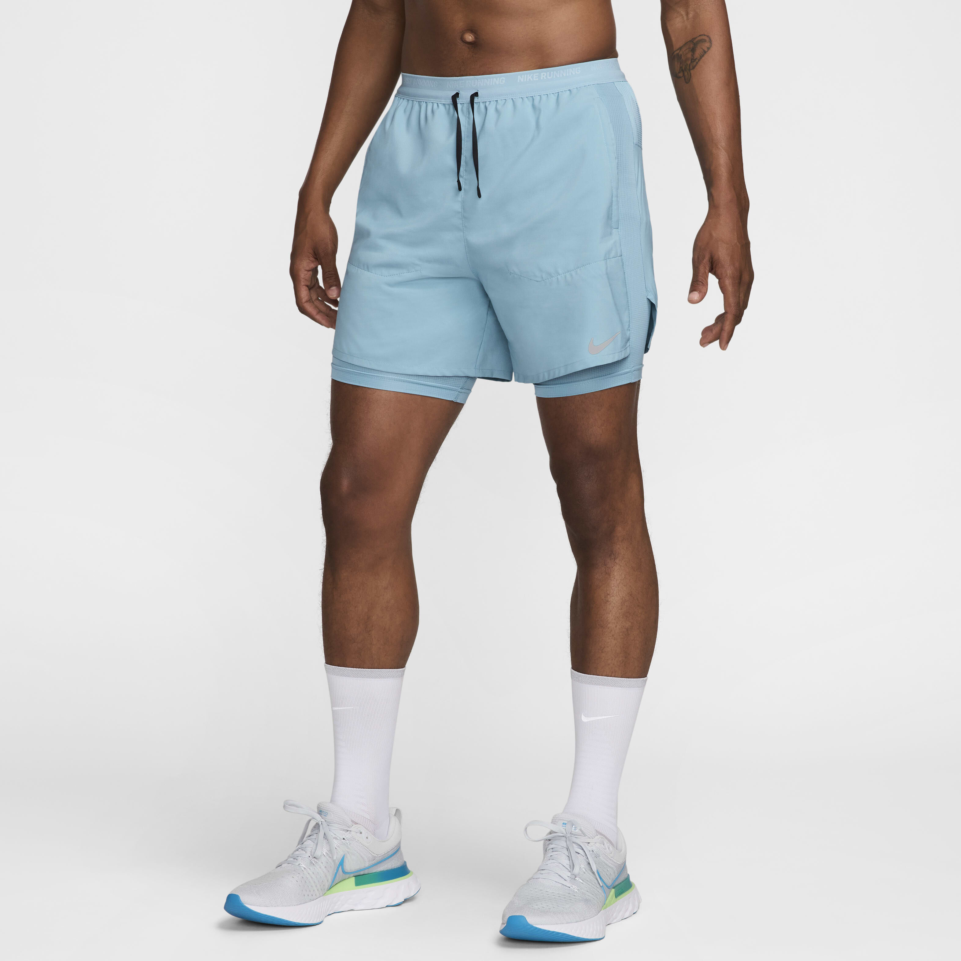 Buy Nike Stride Men s Dri FIT 13cm approx. Hybrid Running Shorts Nike Qatar Official