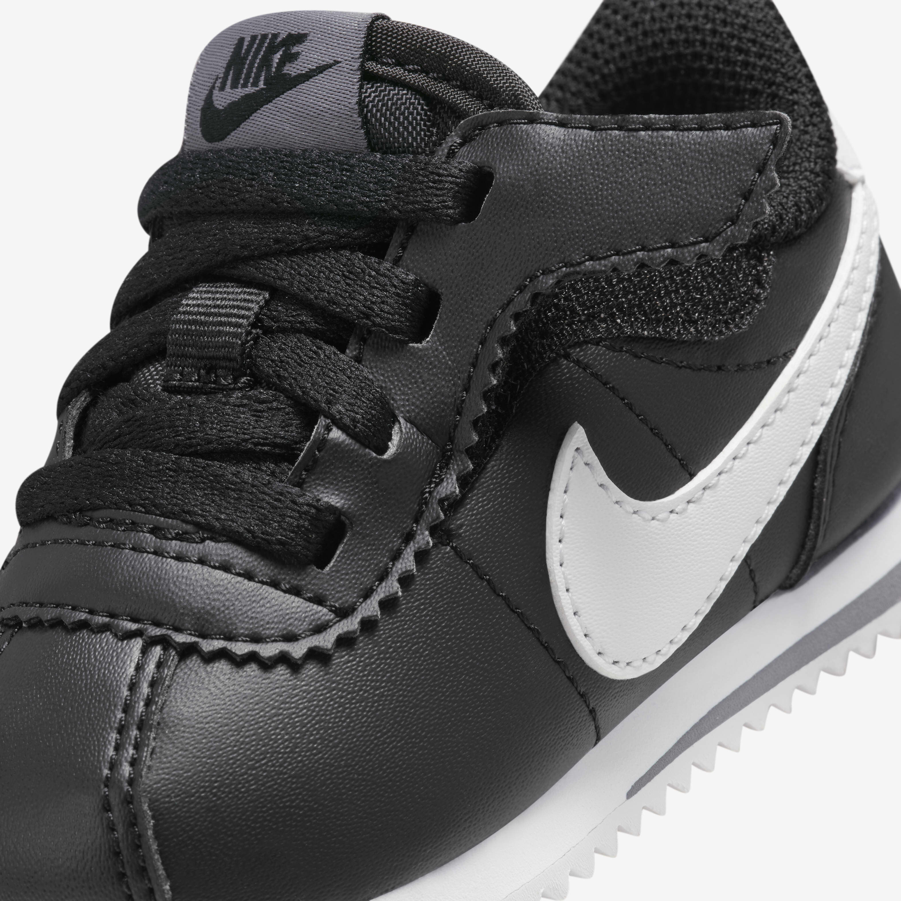 Nike cortez kids black deals