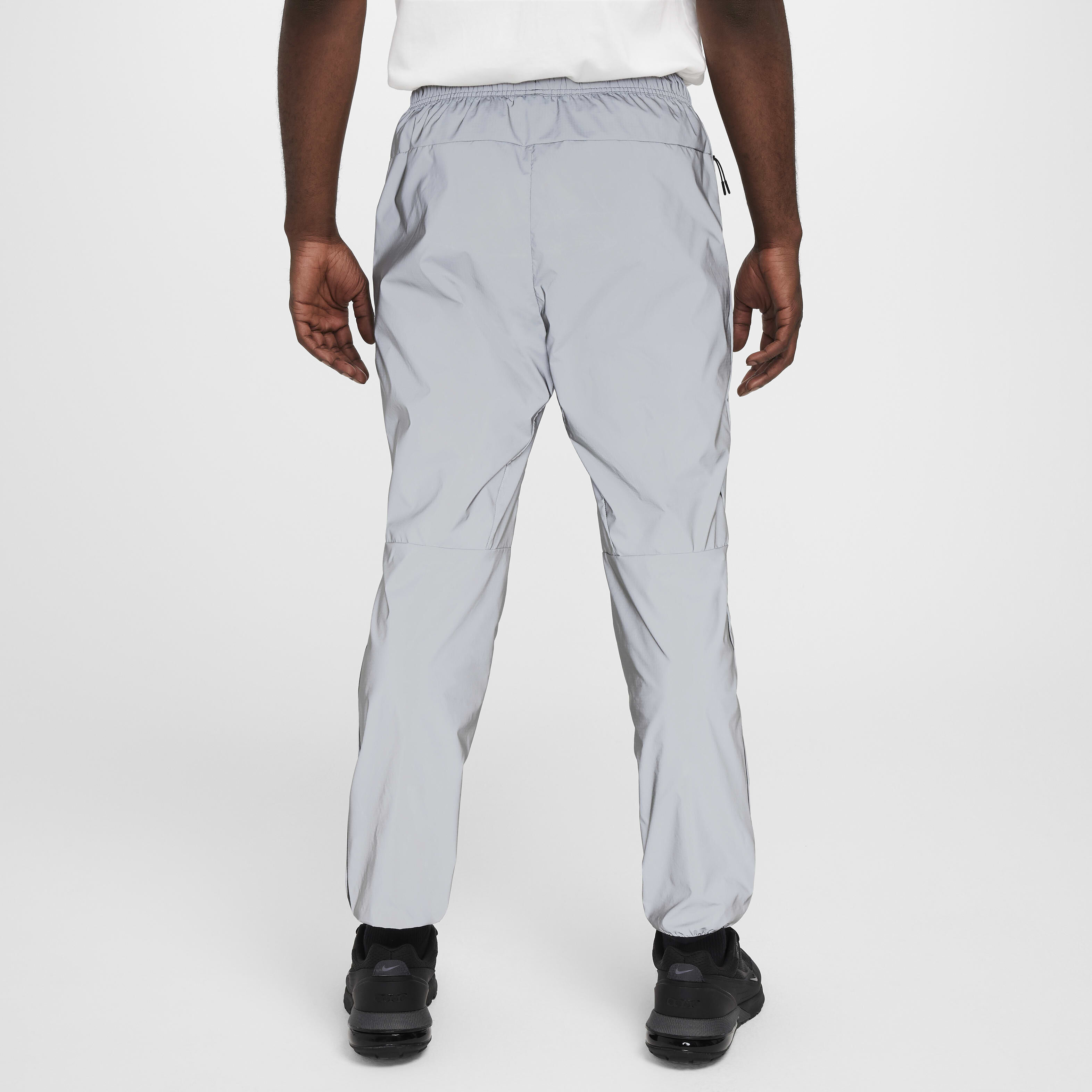 Nike acw track pants deals