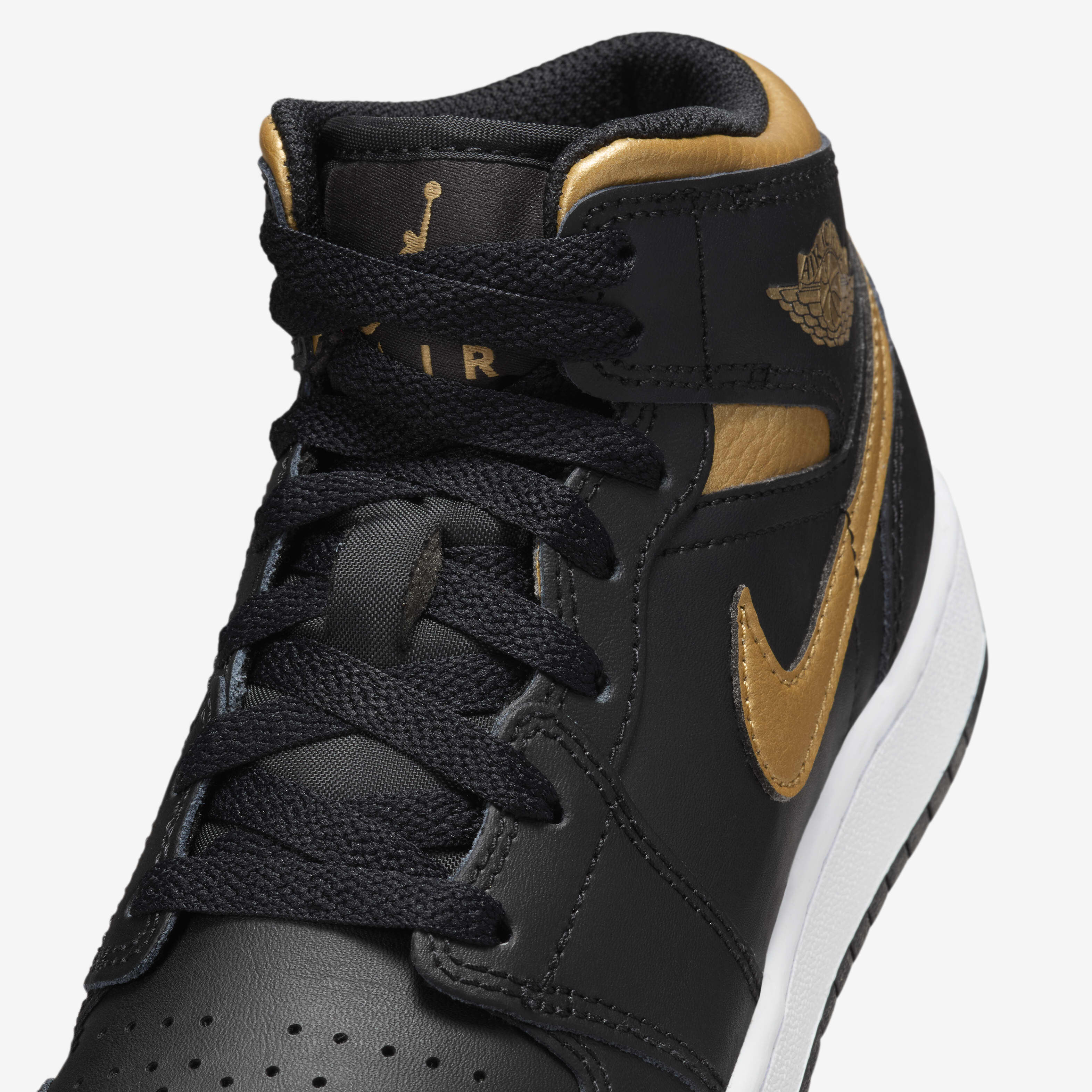 Jordan 1 mid black university gold best sale
