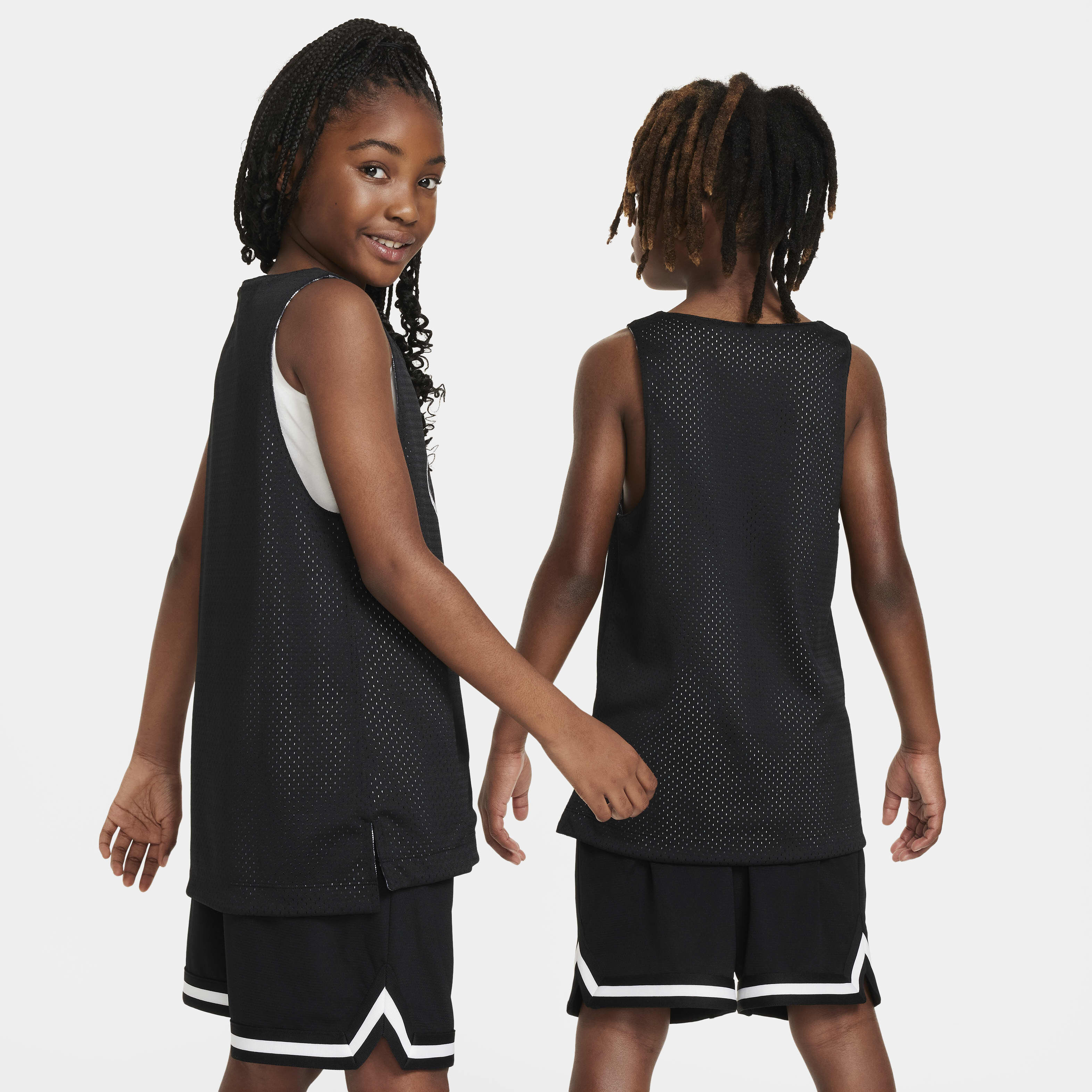 Buy Nike Culture of Basketball Older Kids' Reversible Jersey -  Black/Black/White | Nike Qatar Official
