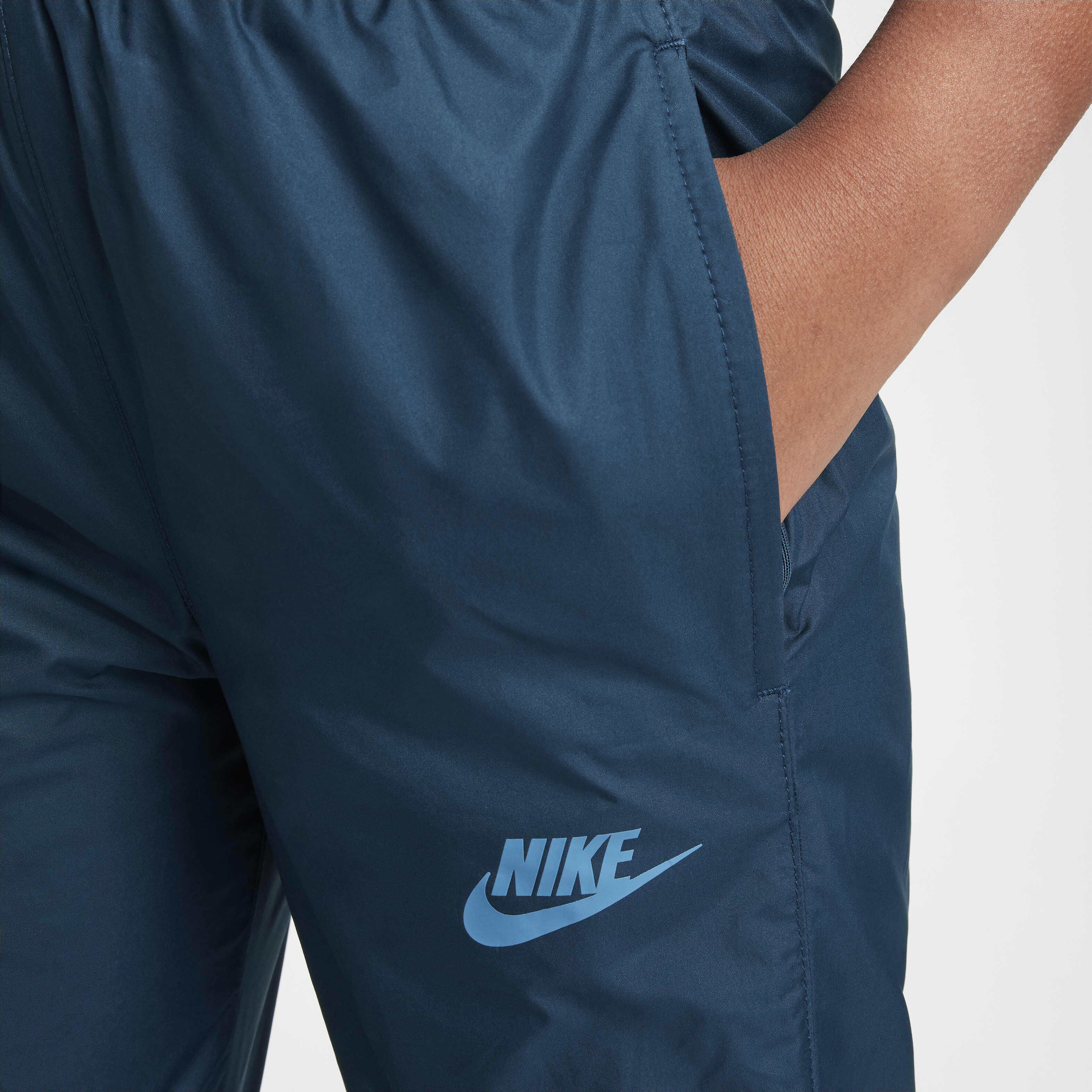 Buy Nike Sportswear Windrunner EasyOn Older Kids Repel Trousers Nike Qatar Official