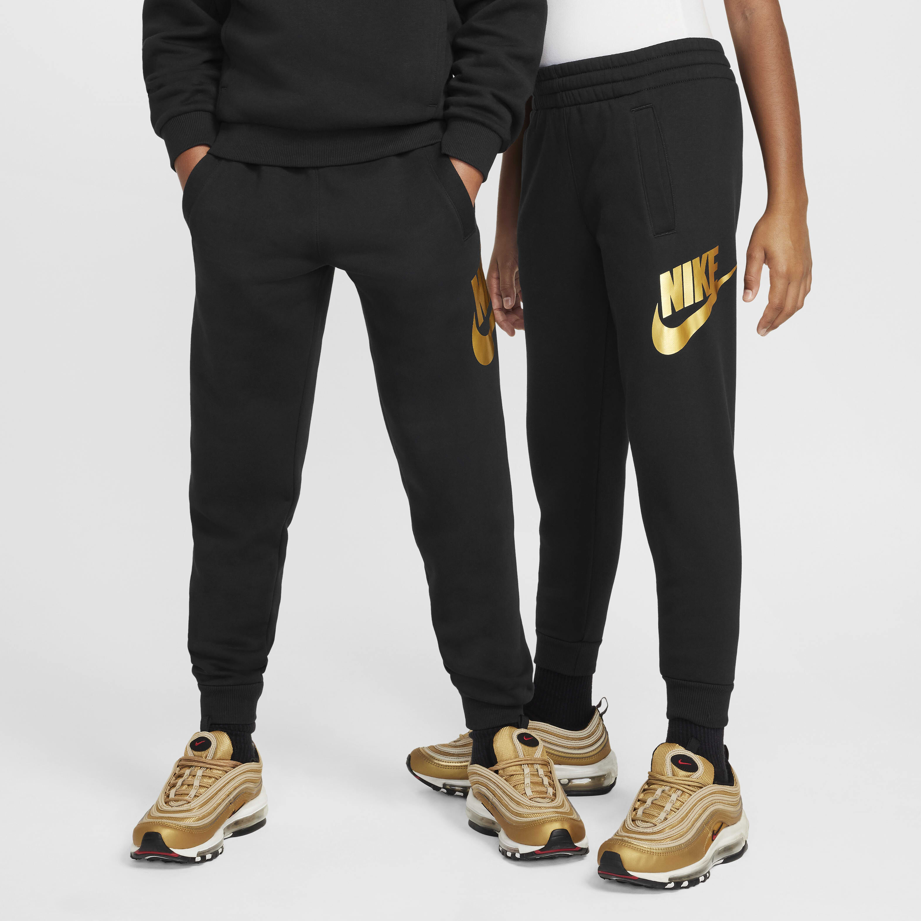 Nike women's black and gold joggers 2025