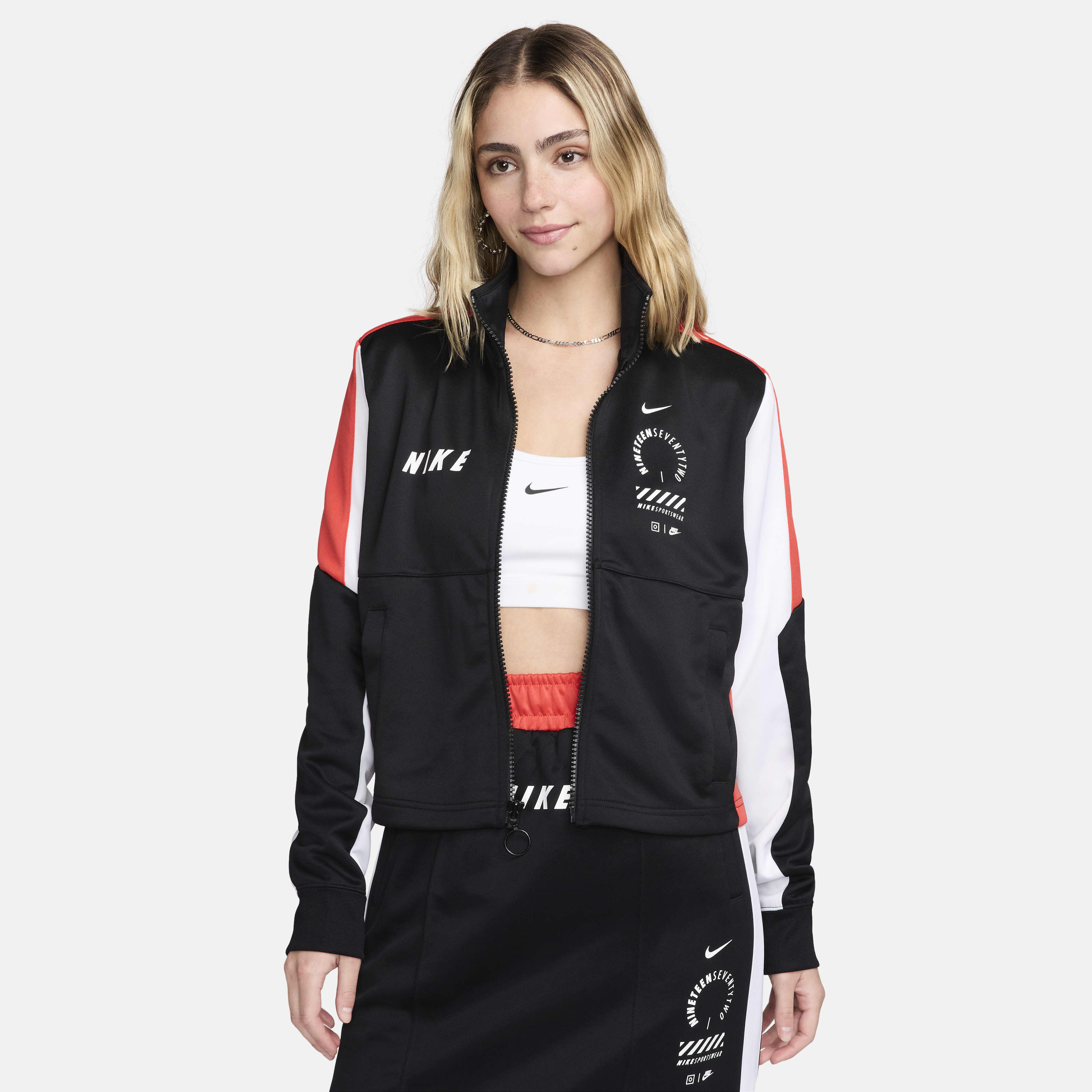 Nike black track top discount