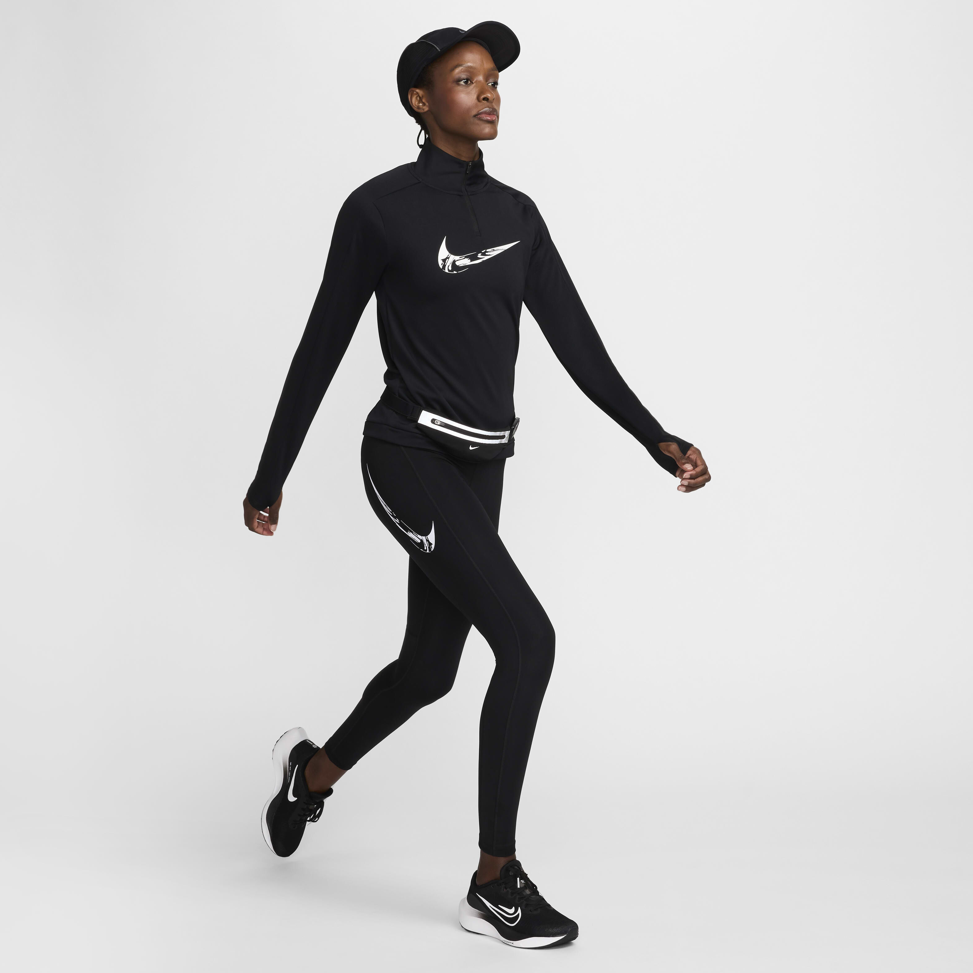 Buy Nike Swoosh Women s Dri FIT 1 4 Zip Running Mid Layer Nike Qatar Official