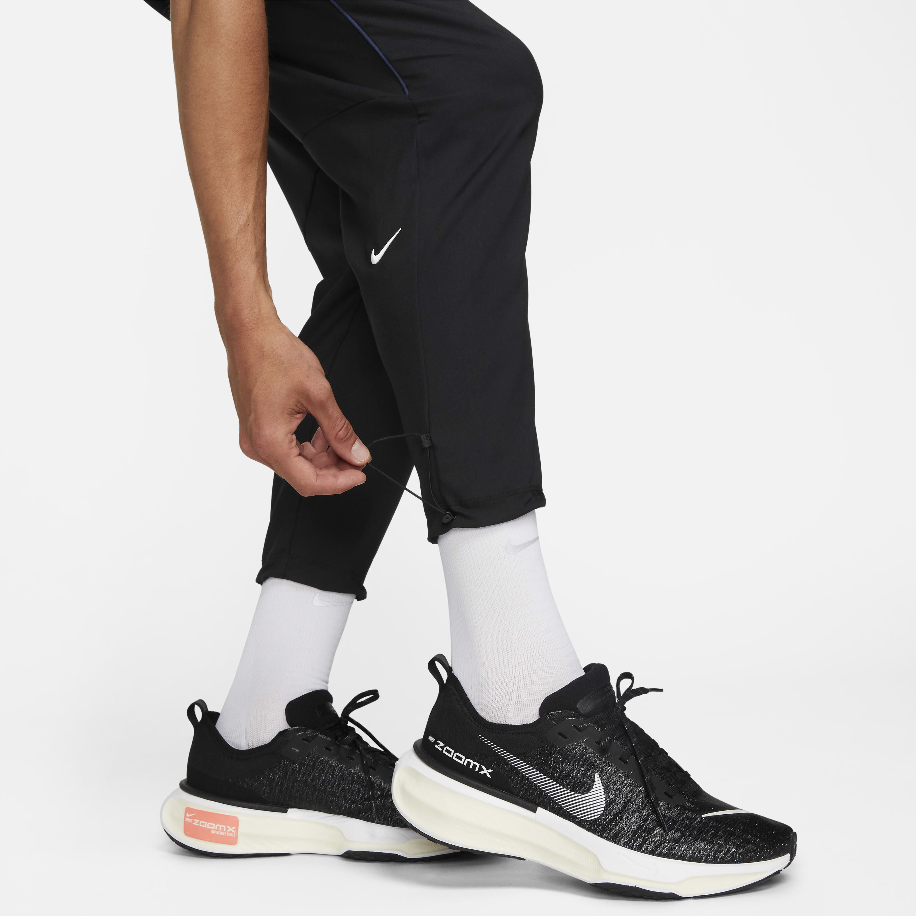Buy Nike Challenger Track Club Men s Dri FIT Running Trousers Nike Qatar Official