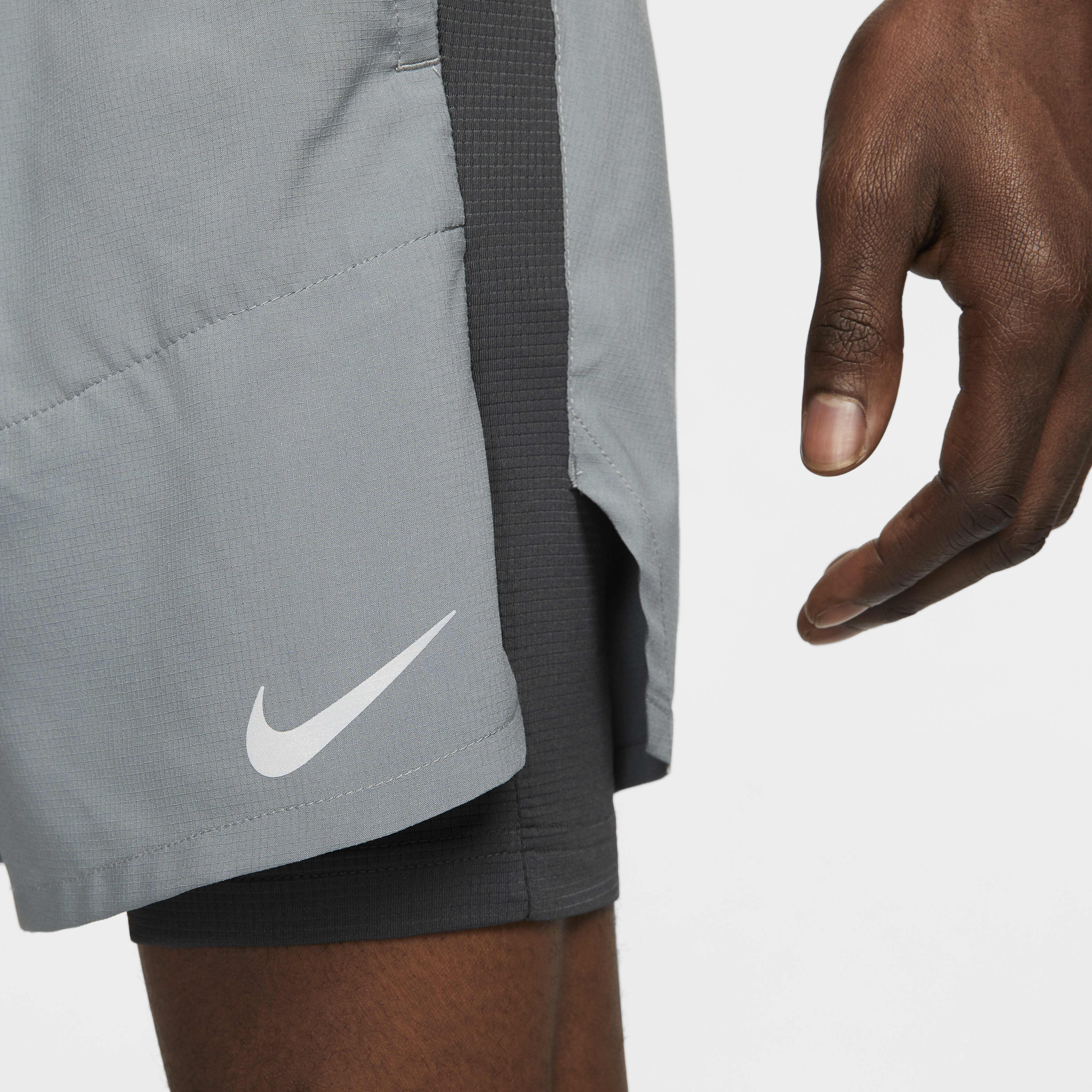 Buy Nike Stride Men s Dri FIT 13cm approx. Hybrid Running Shorts Nike Qatar Official