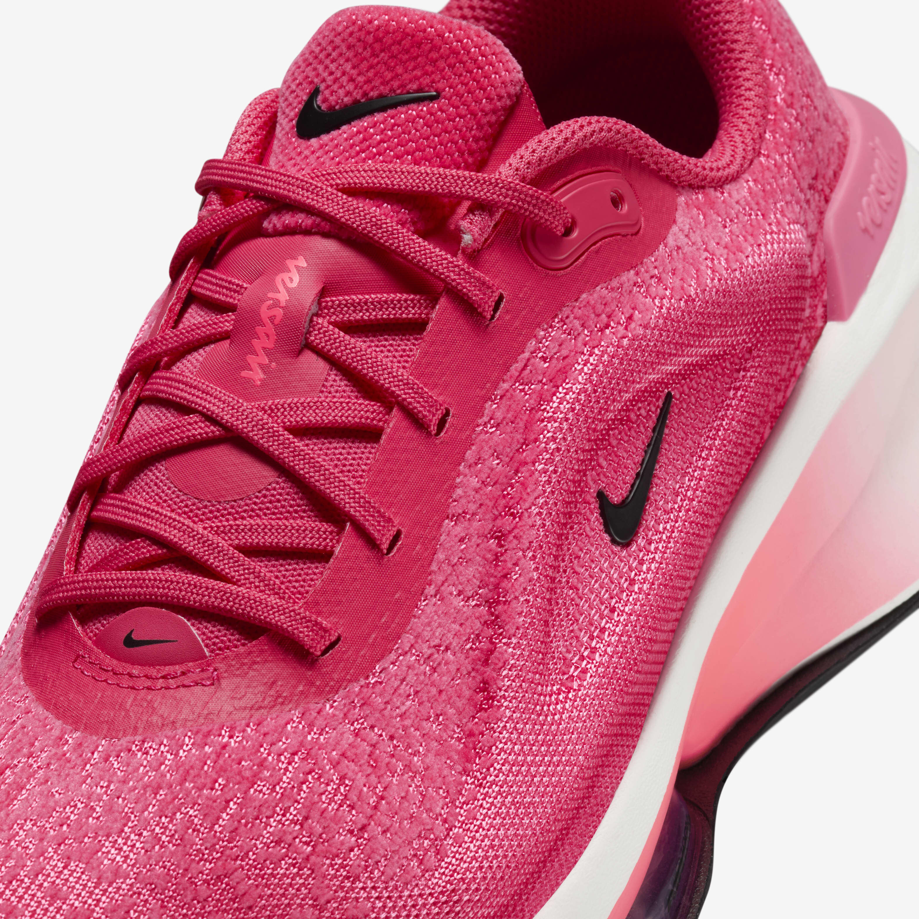 Nike versa pink cheap