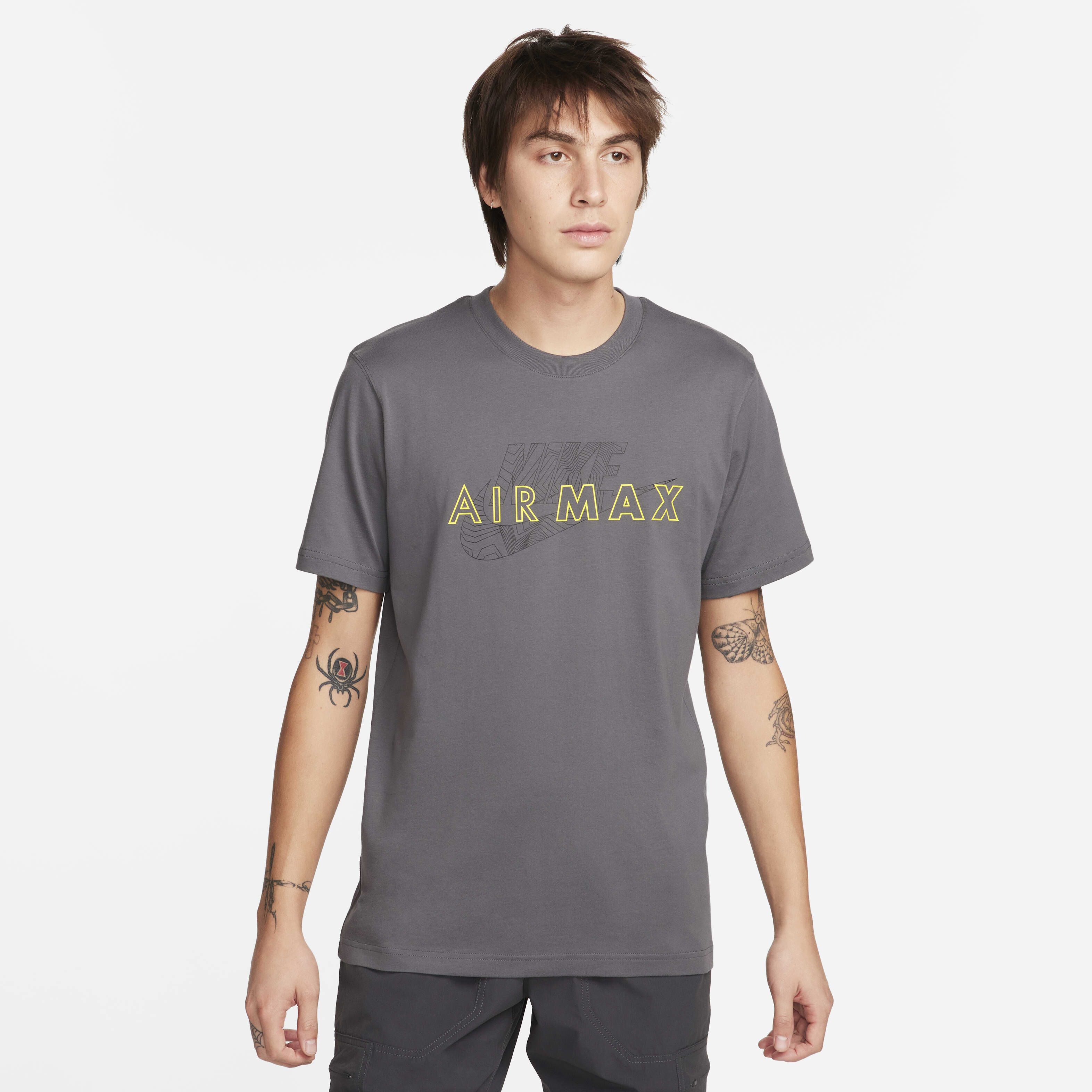 grey and yellow nike shirt