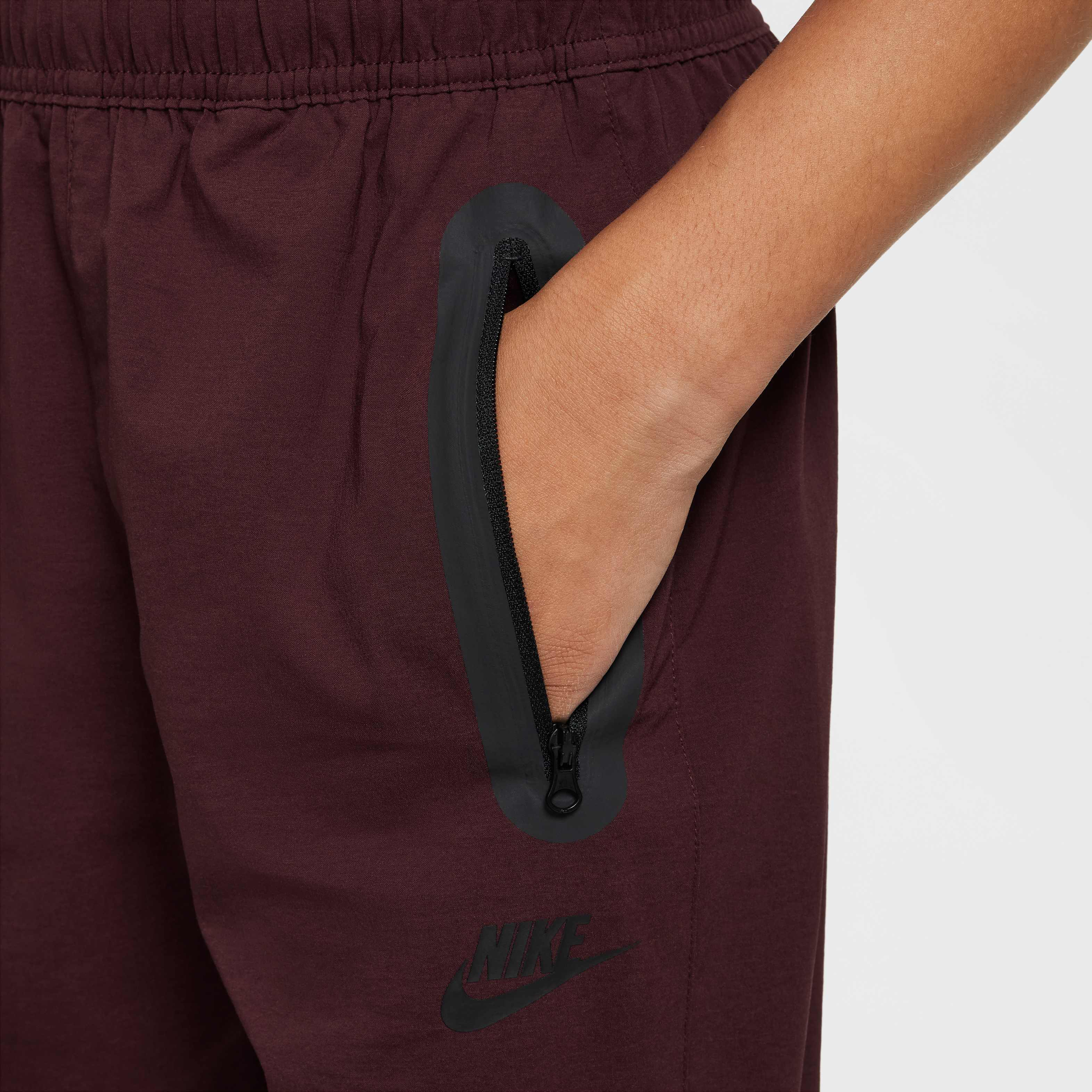 Buy Nike Tech Older Kids' (Boys') Woven Trousers - Burgundy