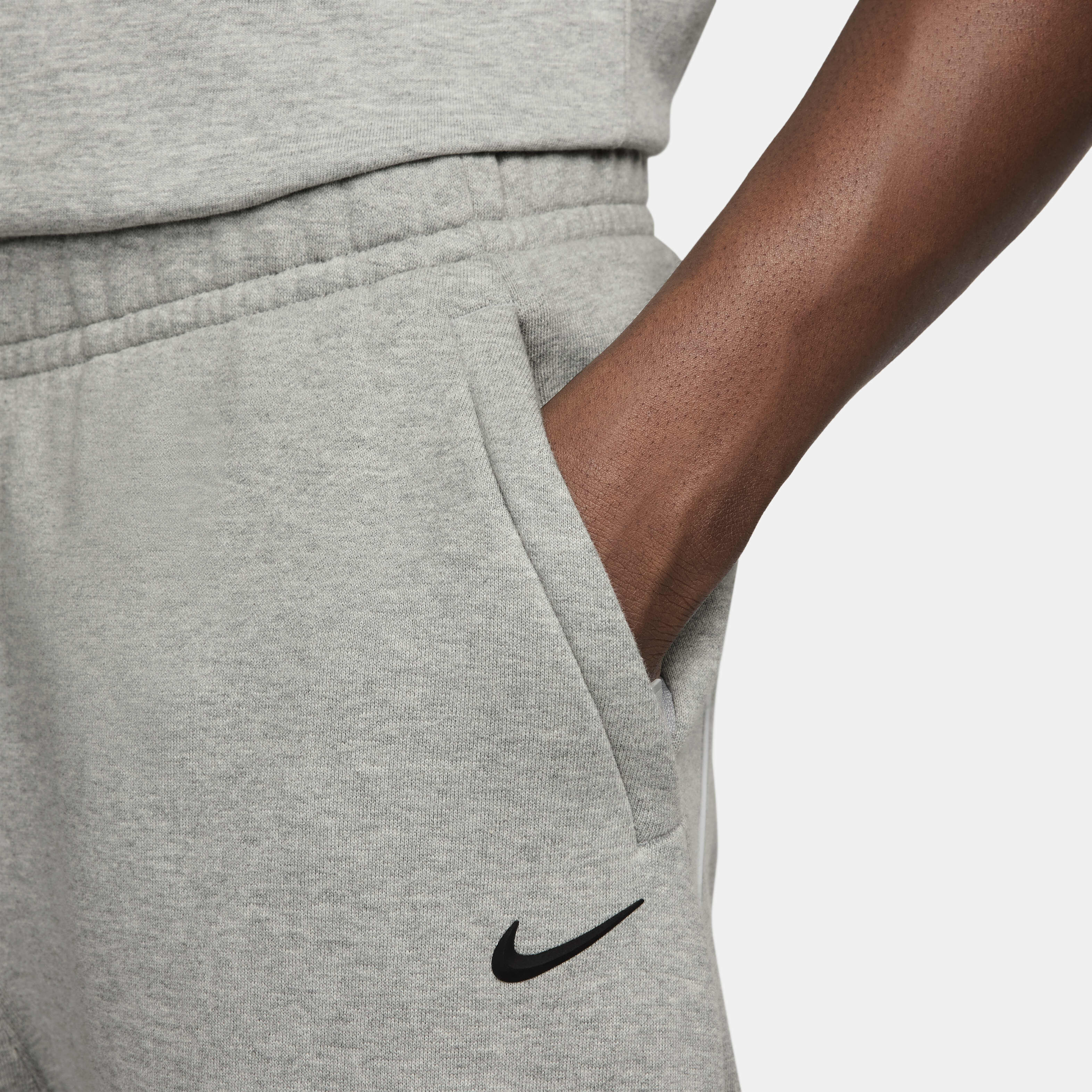 Nike tracksuit bottoms with zip pockets sale