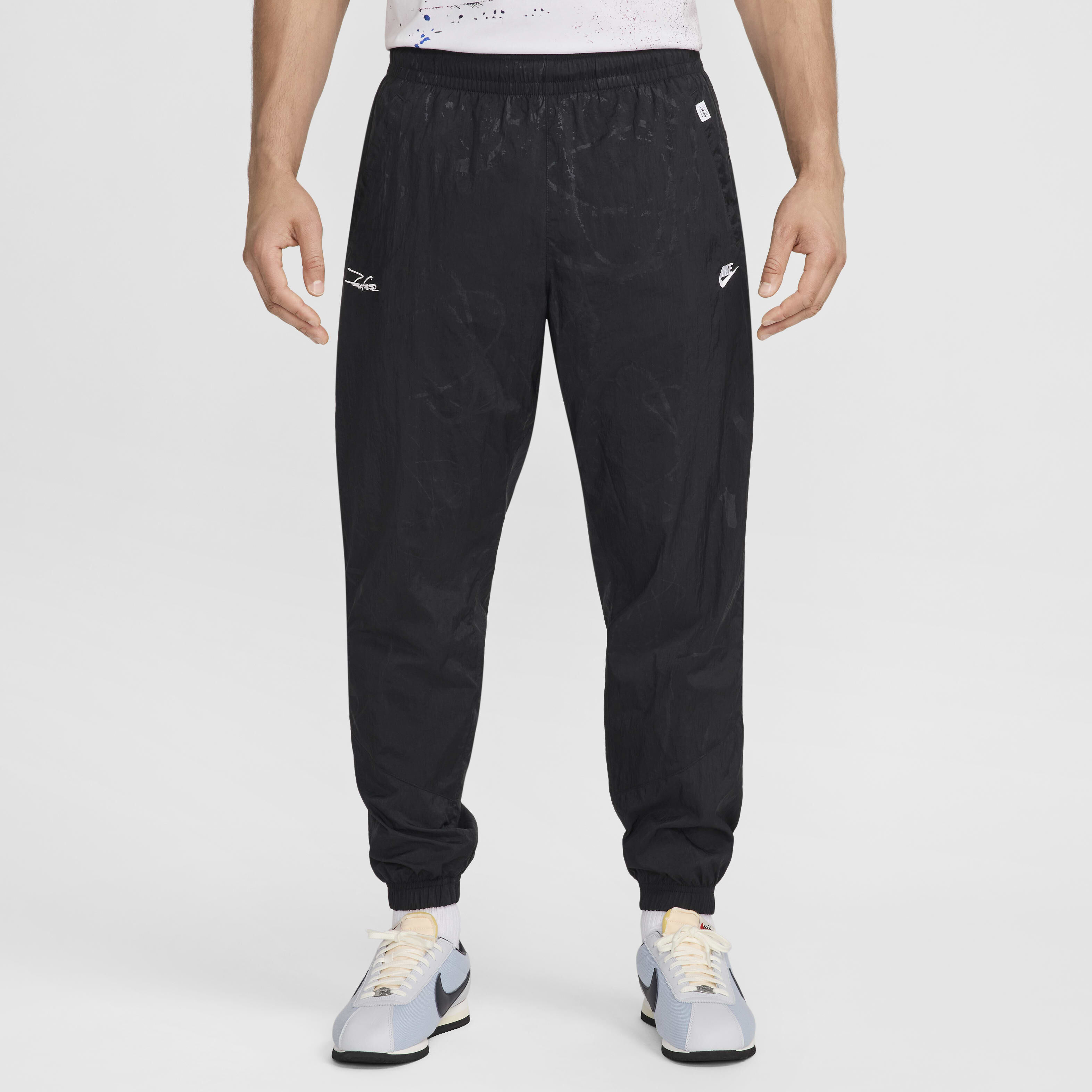 Buy Nike Sportswear Men s Breaking Lined Windrunner Trousers Nike Qatar Official