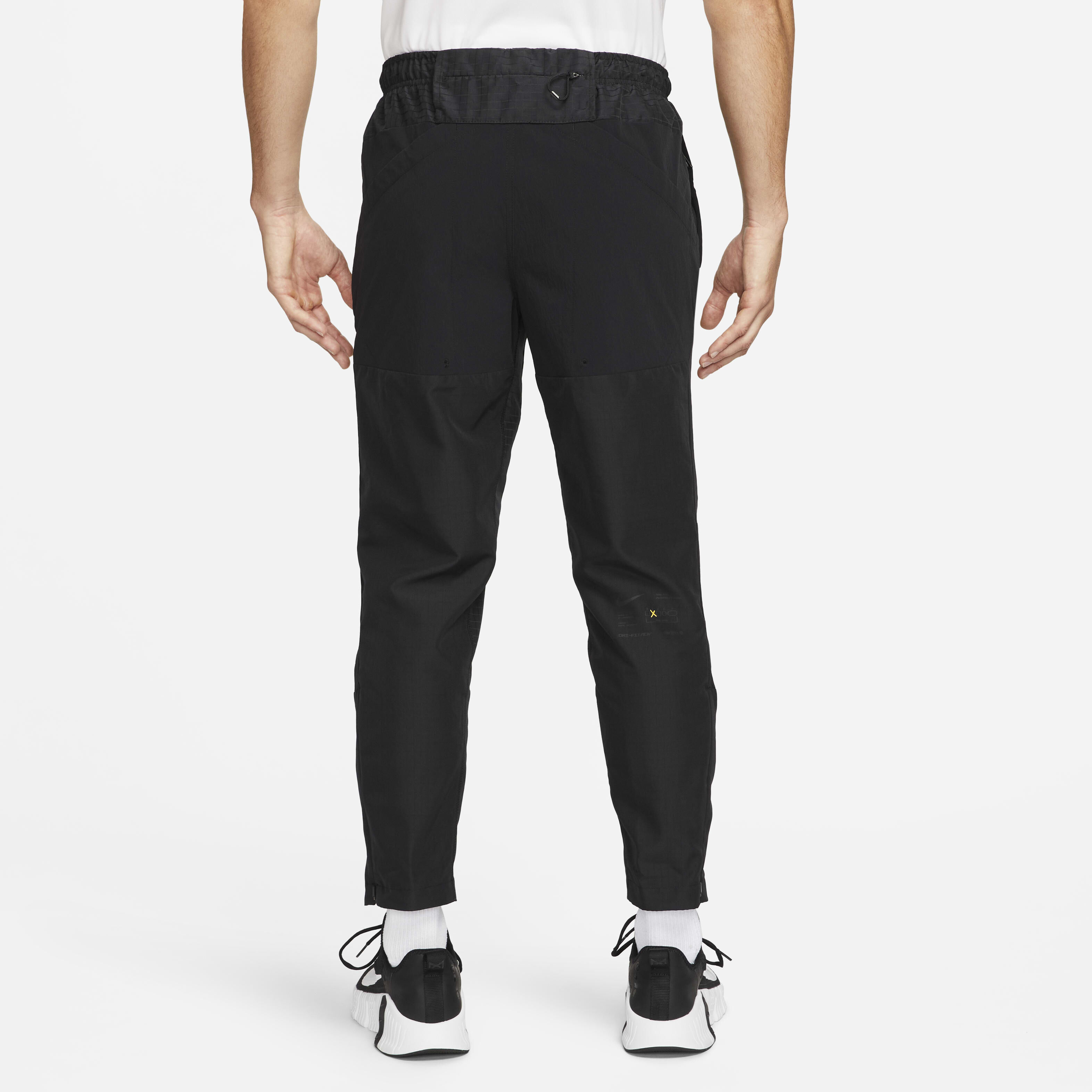 Buy Nike APS Men's Dri-FIT ADV Woven Versatile Trousers - Black