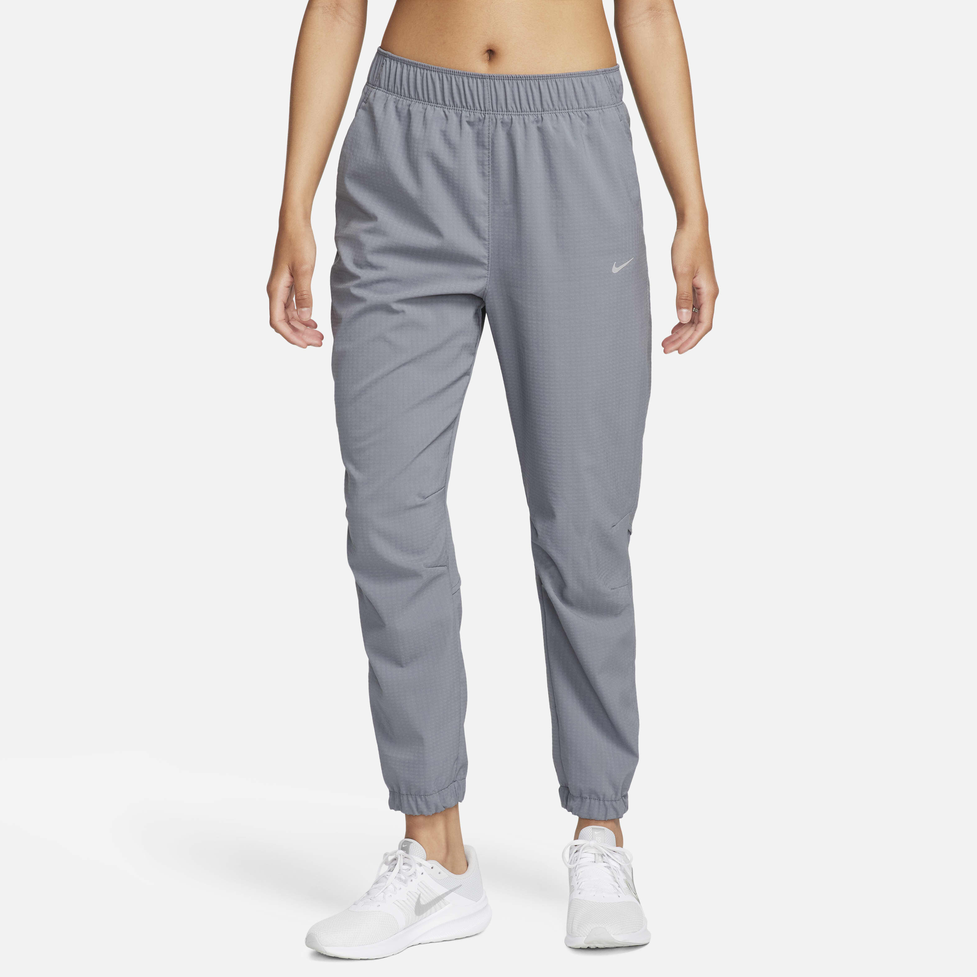 Buy Nike Dri FIT Fast Women s Mid Rise 7 8 Warm Up Running Trousers Nike Qatar Official