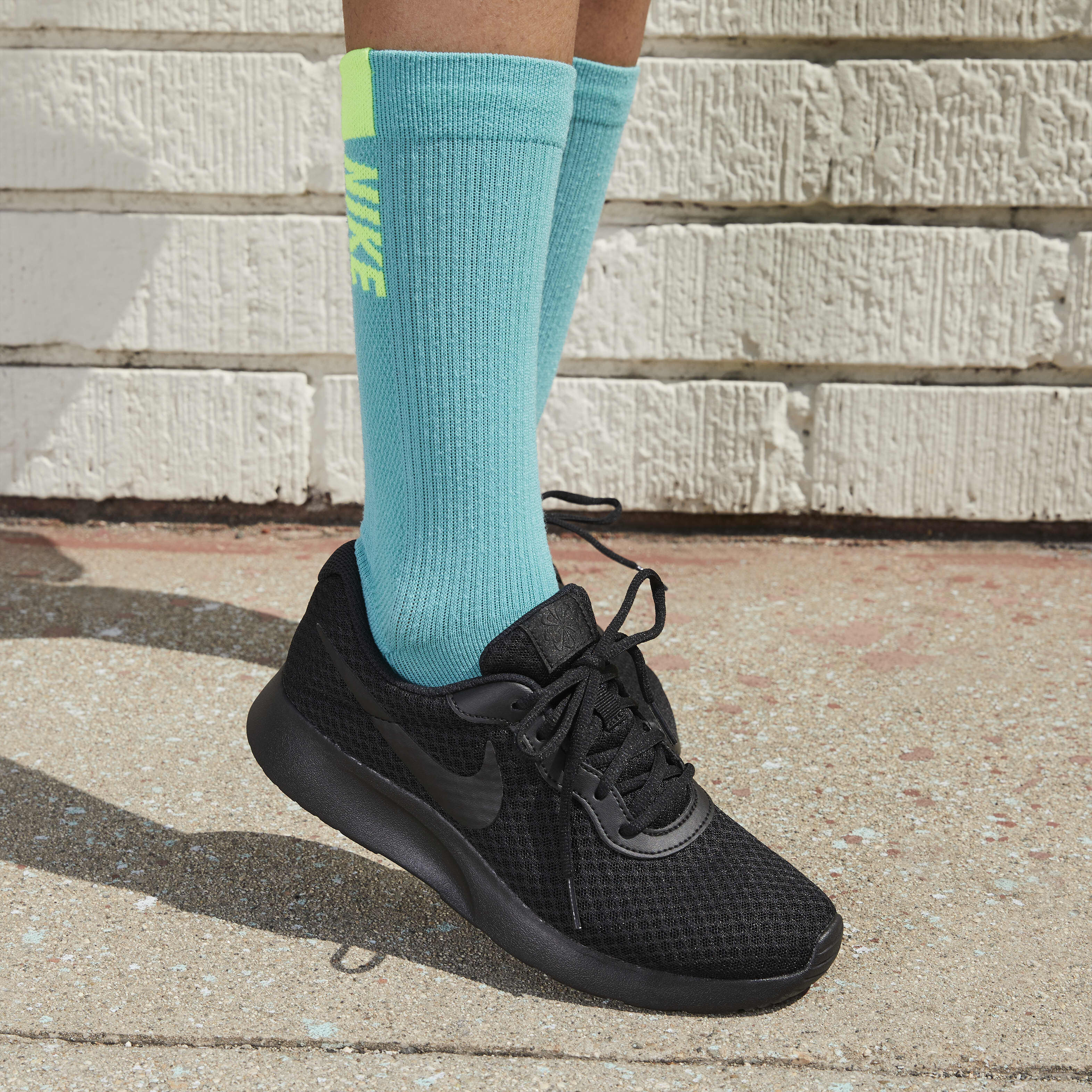 Famous footwear nike tanjun women's deals