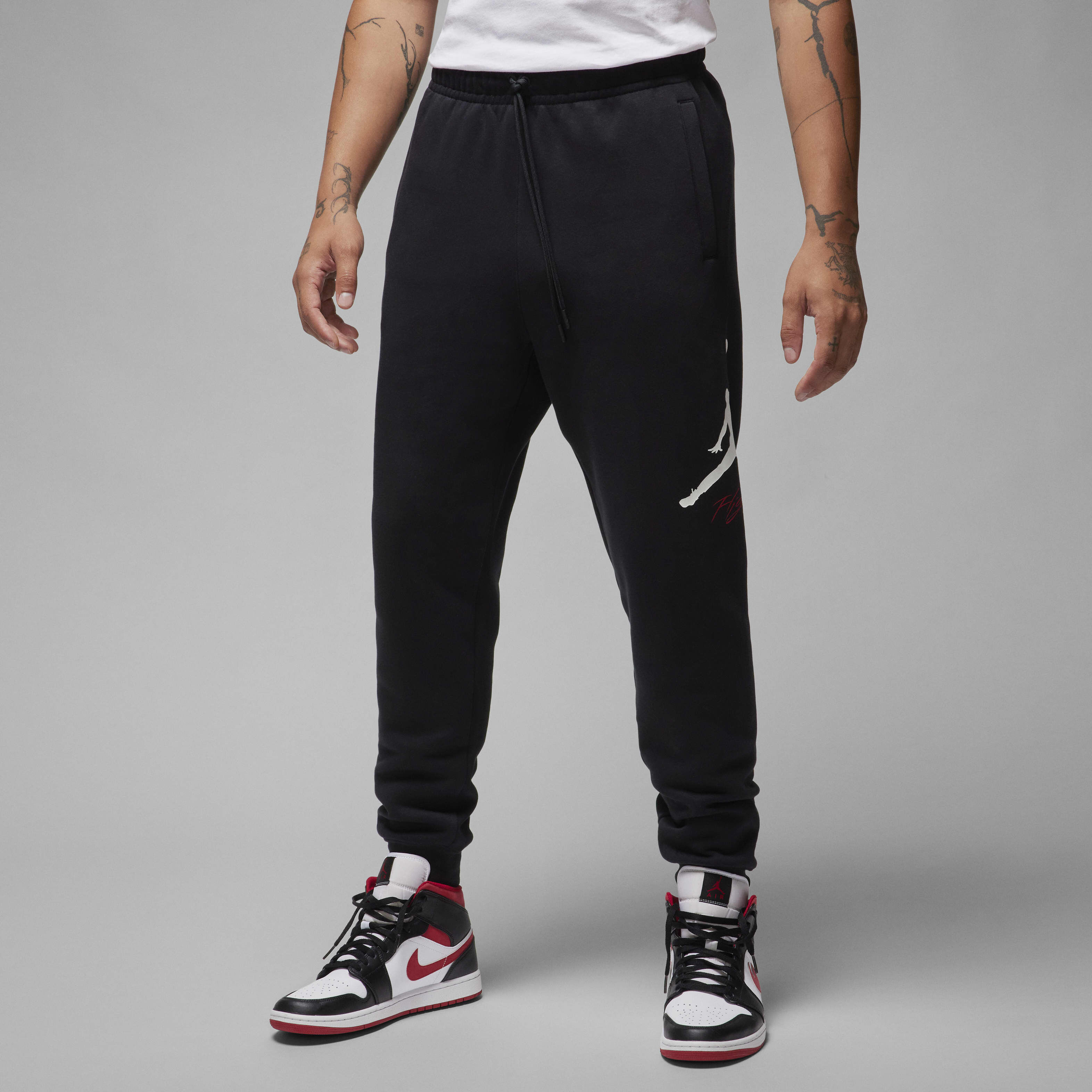 Buy Jordan Essentials Men's Fleece Baseline Trousers Black/White
