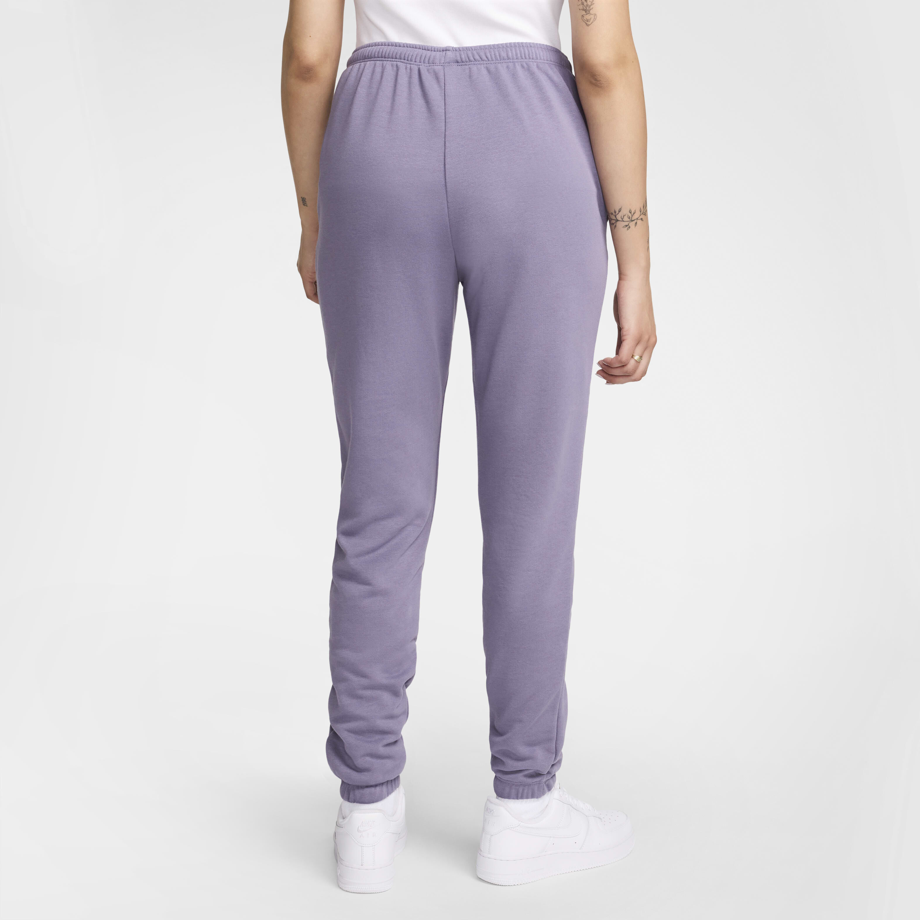 Women's slim fit nike tracksuit sale
