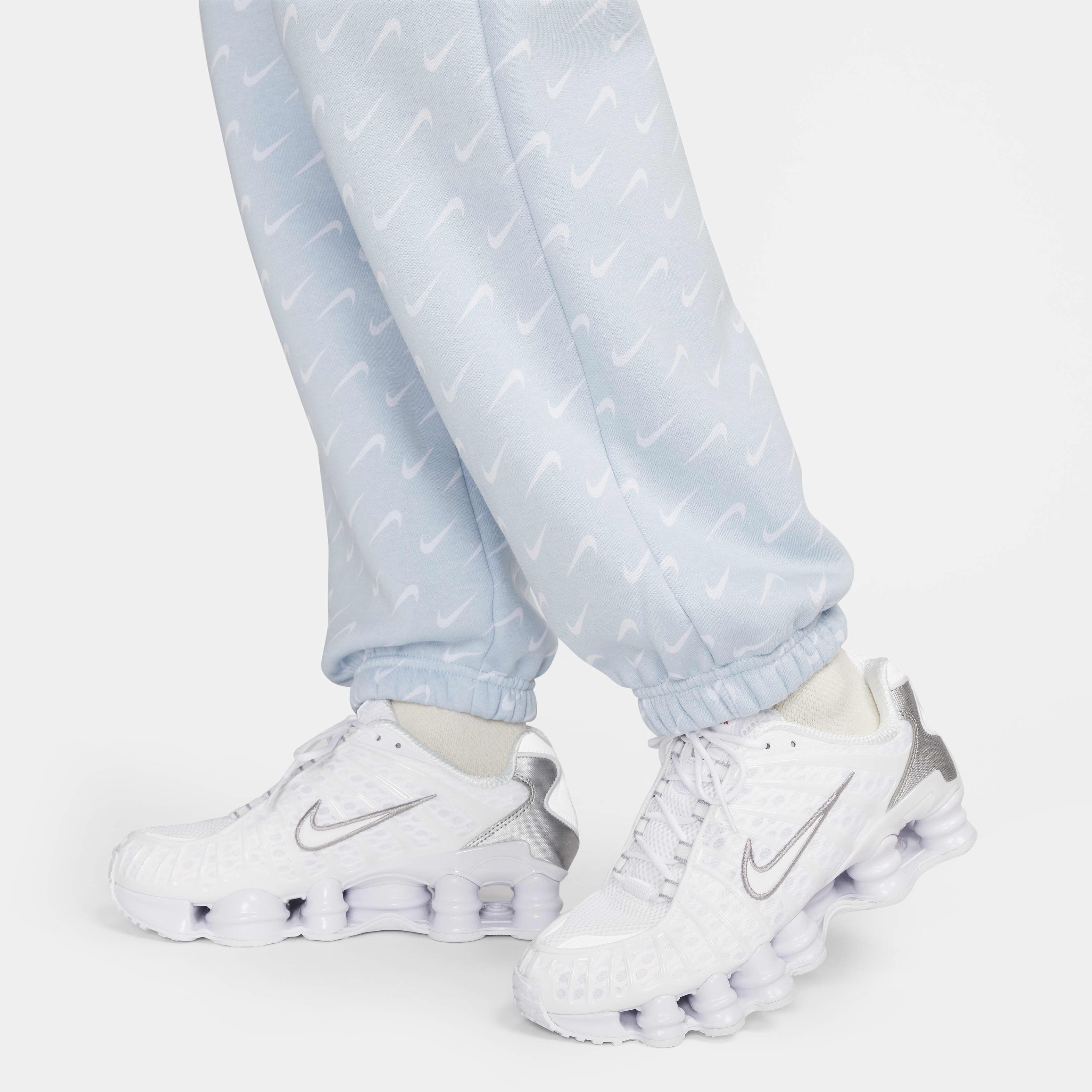 Buy Nike Sportswear Phoenix Fleece Women s Oversized Printed Tracksuit Bottoms Nike Qatar Official