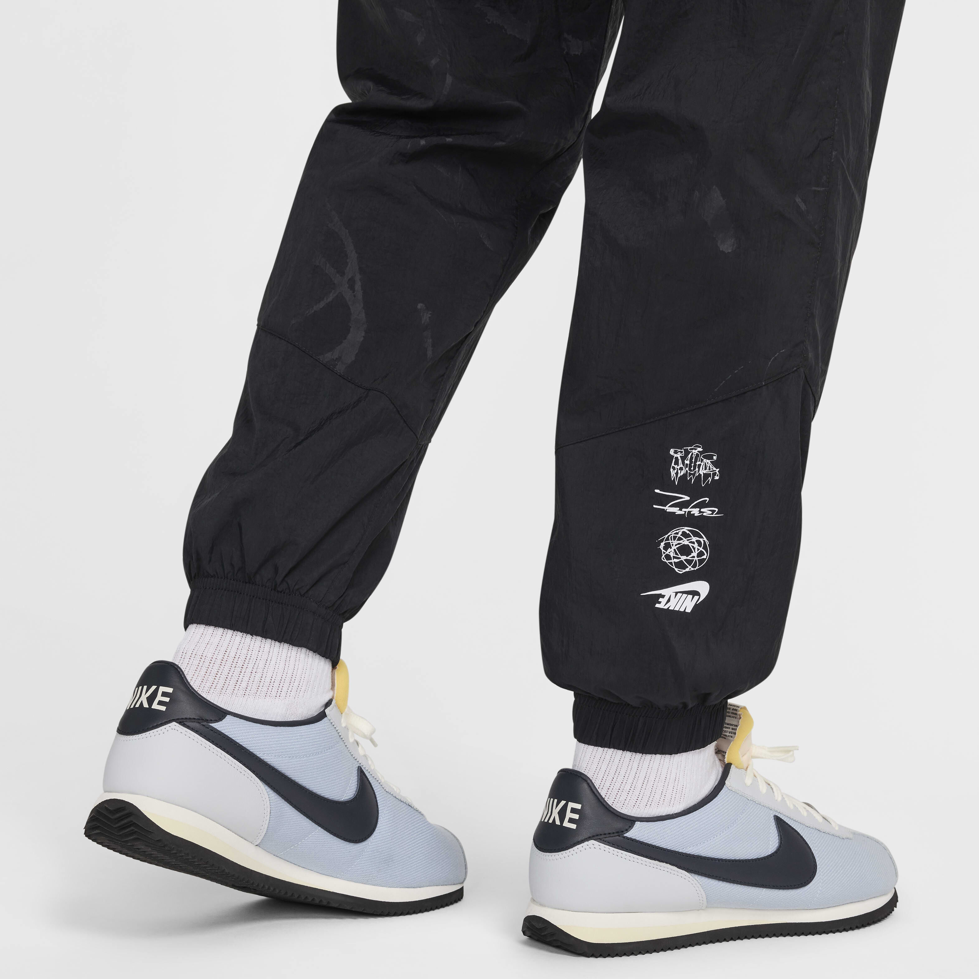 Buy Nike Sportswear Men s Breaking Lined Windrunner Trousers Nike Qatar Official