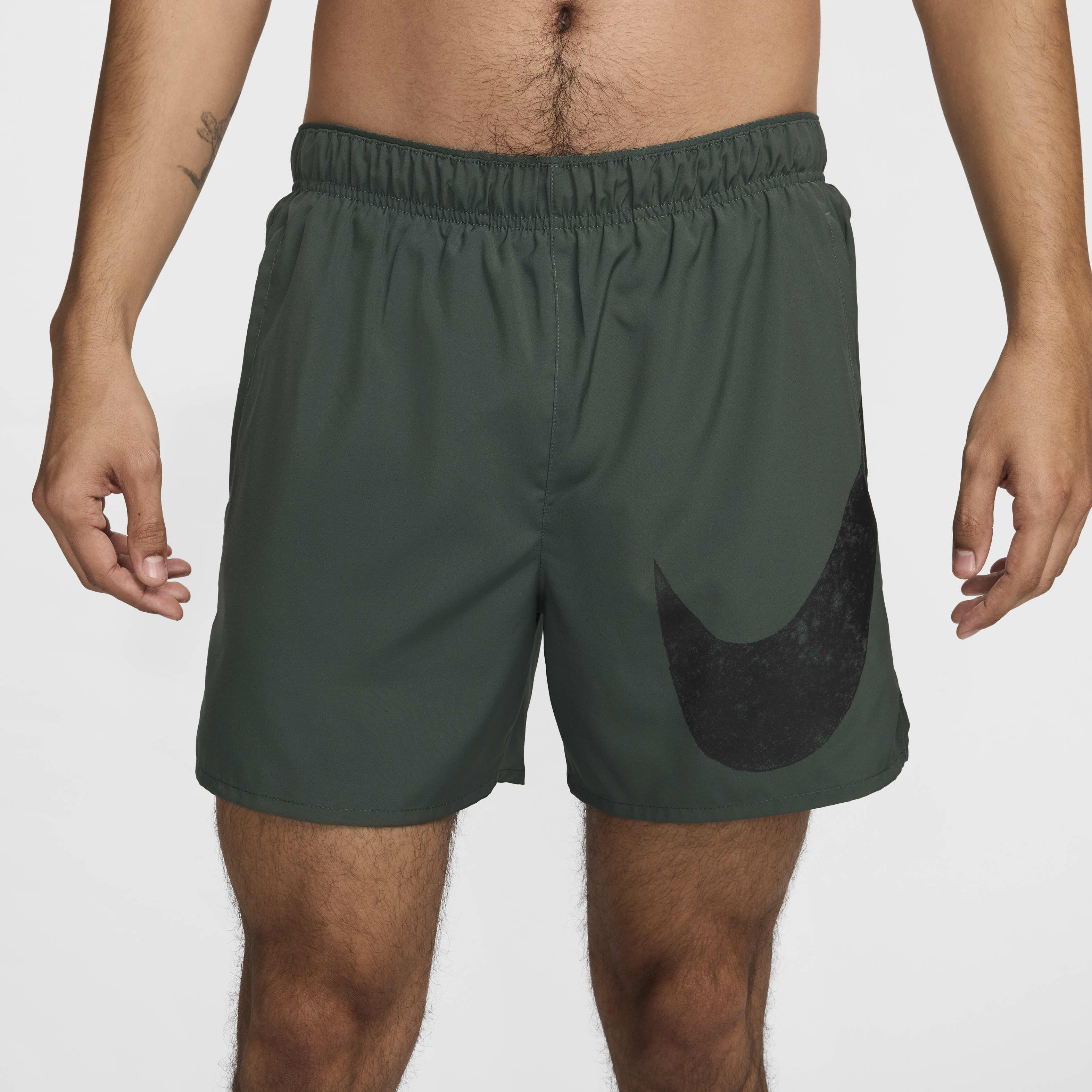 Buy Nike Challenger Swoosh Men s 12.5cm approx. Dri FIT Running Shorts Nike Qatar Official