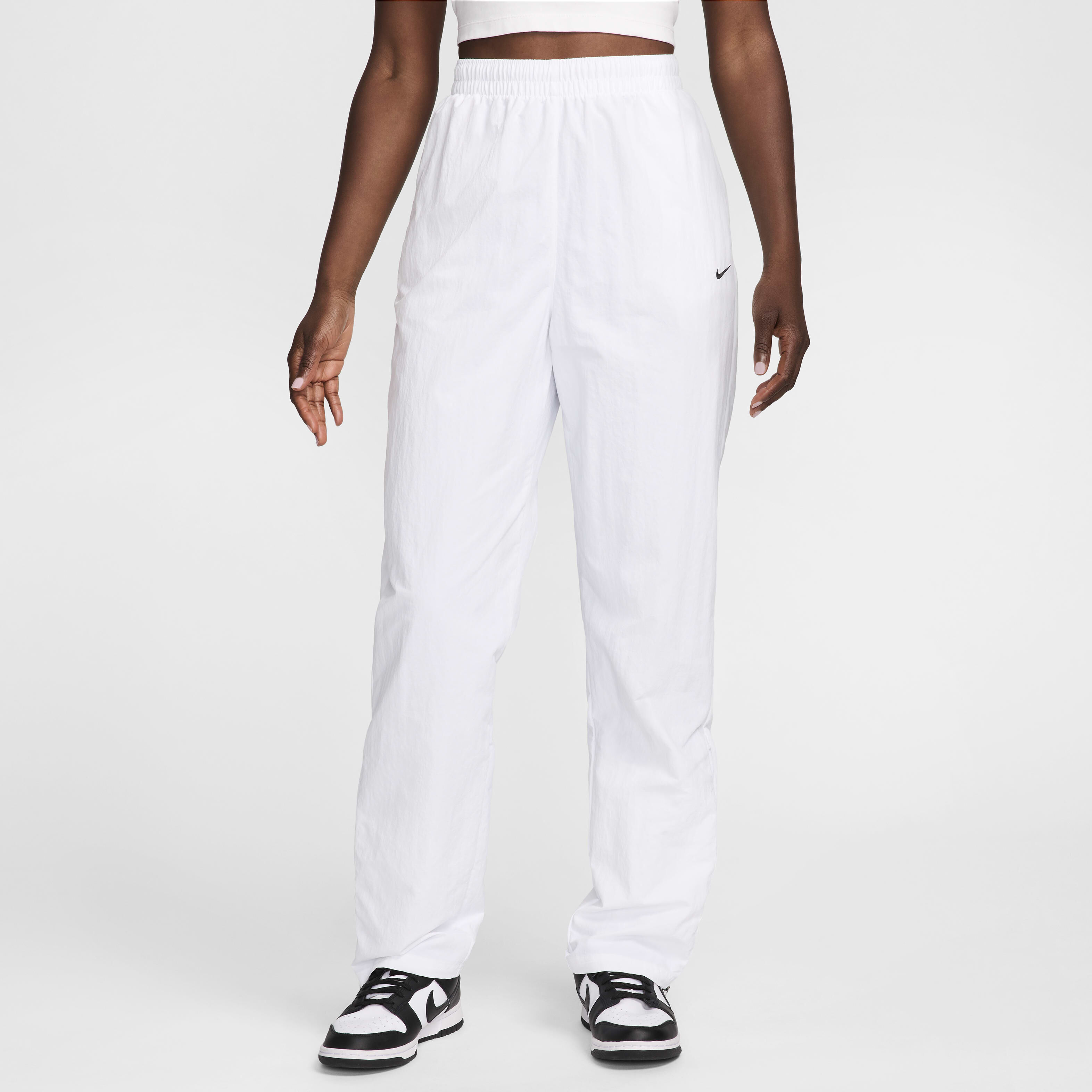 Buy Nike Sportswear Essential Women s UV High Waisted Open Hem Zip Trousers Nike Qatar Official