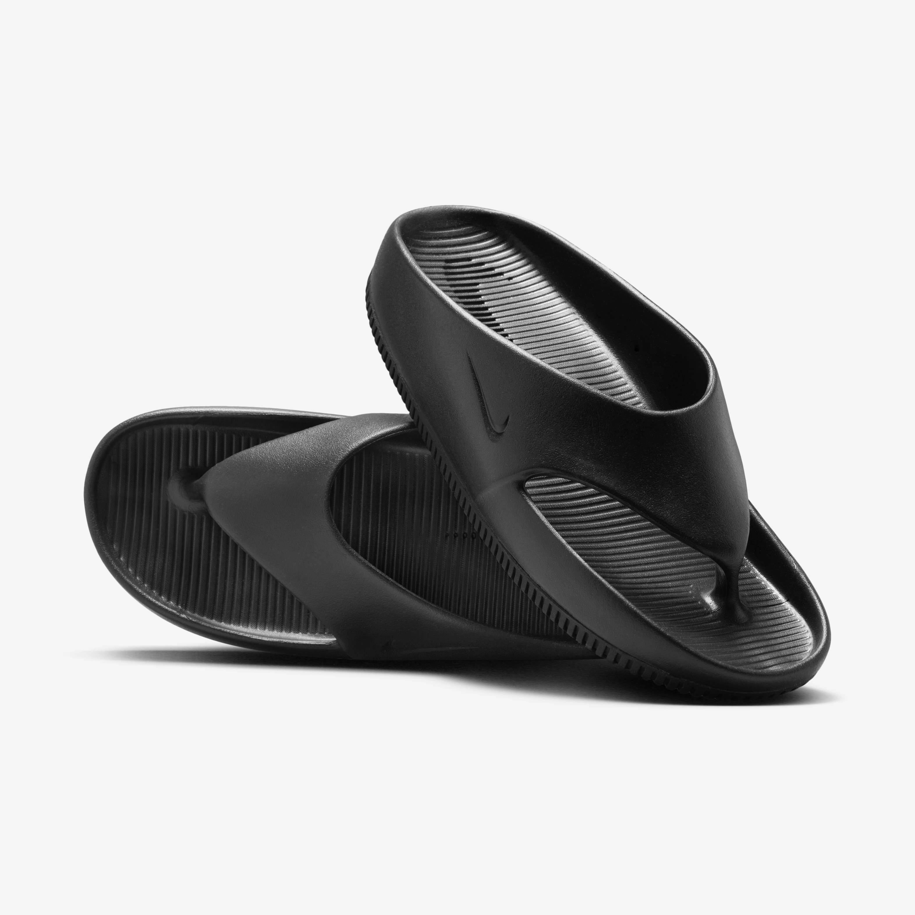 Buy Nike Calm Women's Flip-Flops - Black/Black @ Nike Qatar