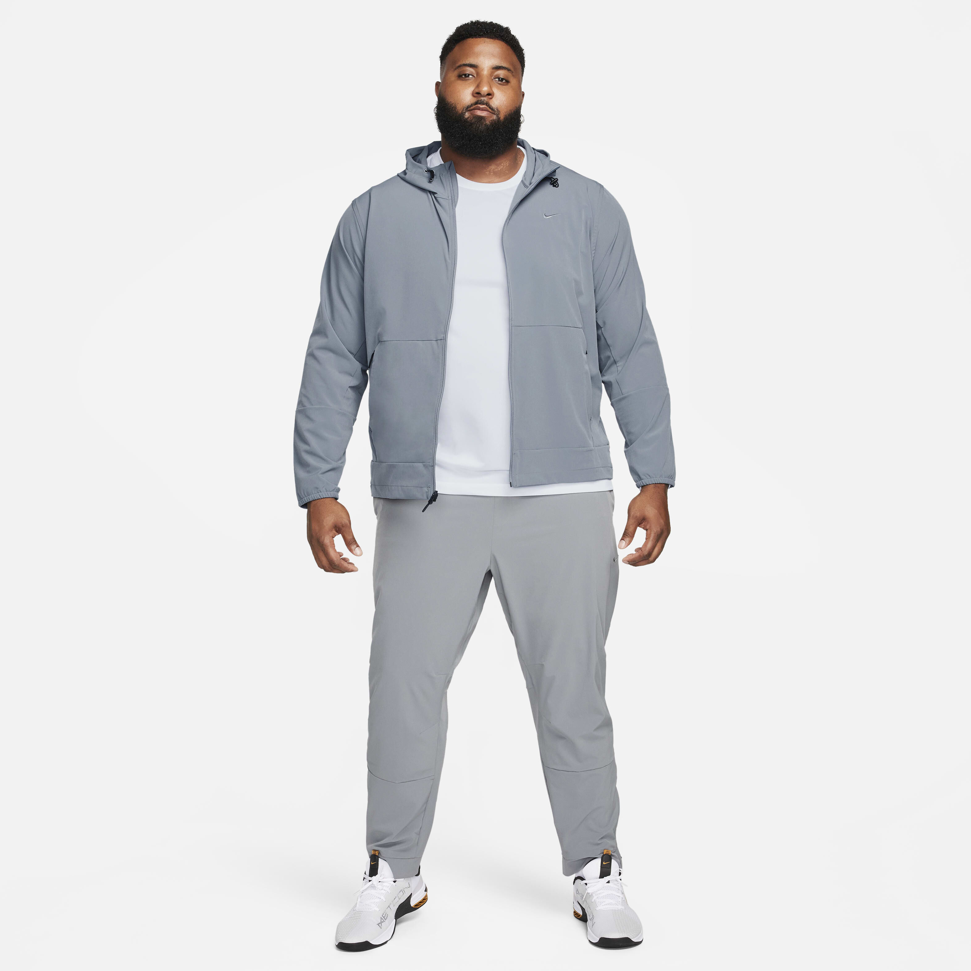 Buy Nike Unlimited Men s Water Repellent Hooded Versatile Jacket Nike Qatar Official