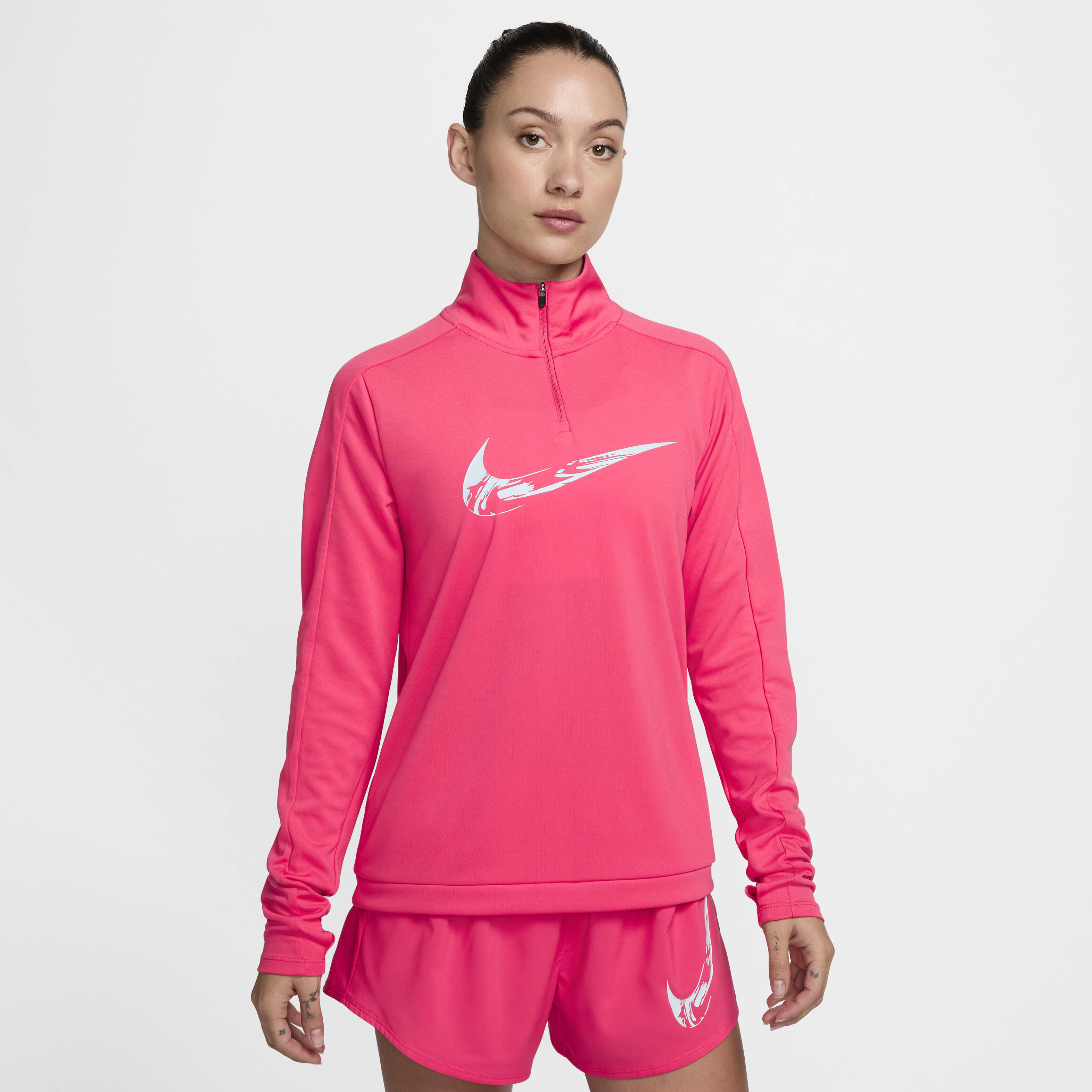 Buy Nike Swoosh Women s Dri FIT 1 4 Zip Running Mid Layer Nike Qatar Official
