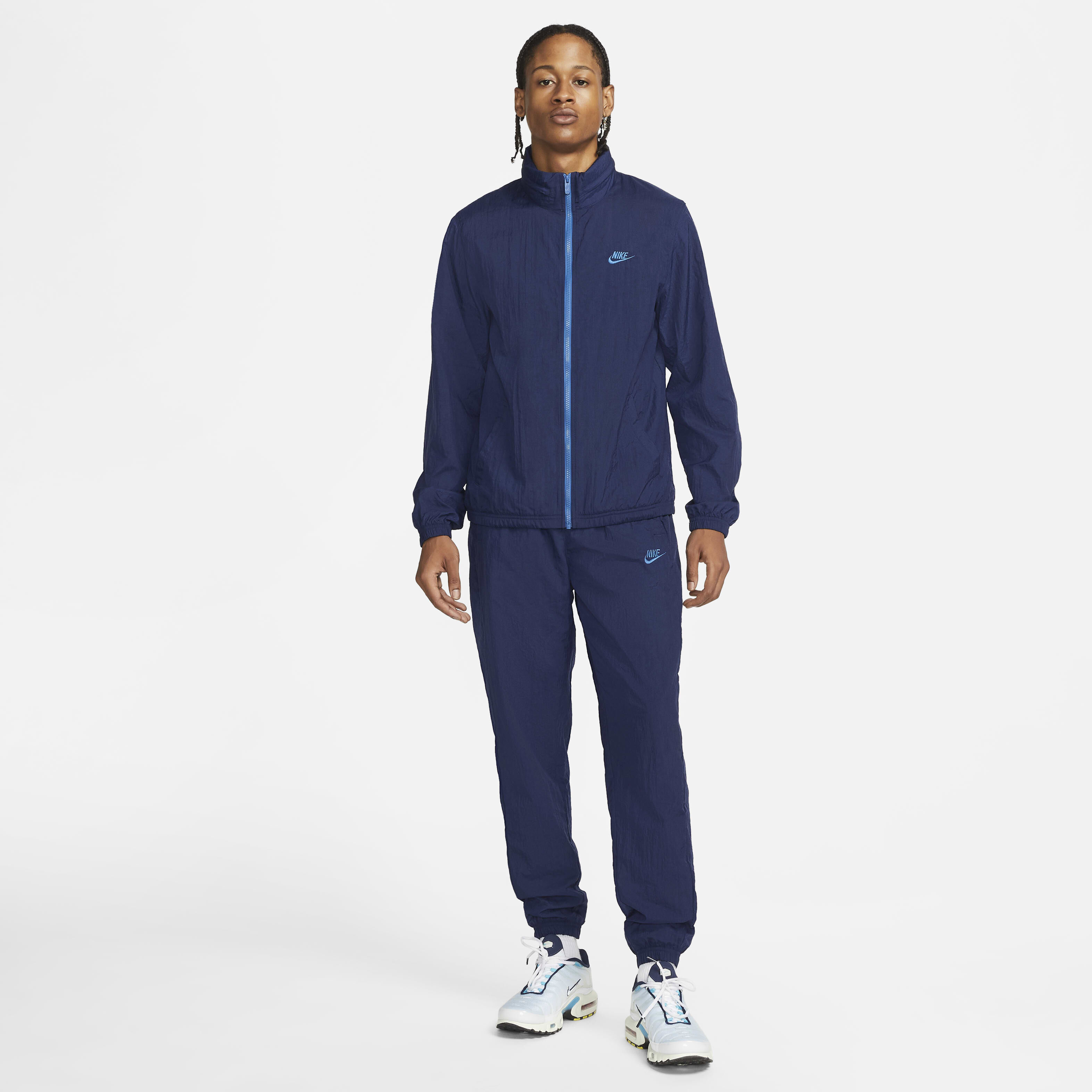 nike tracksuit essential