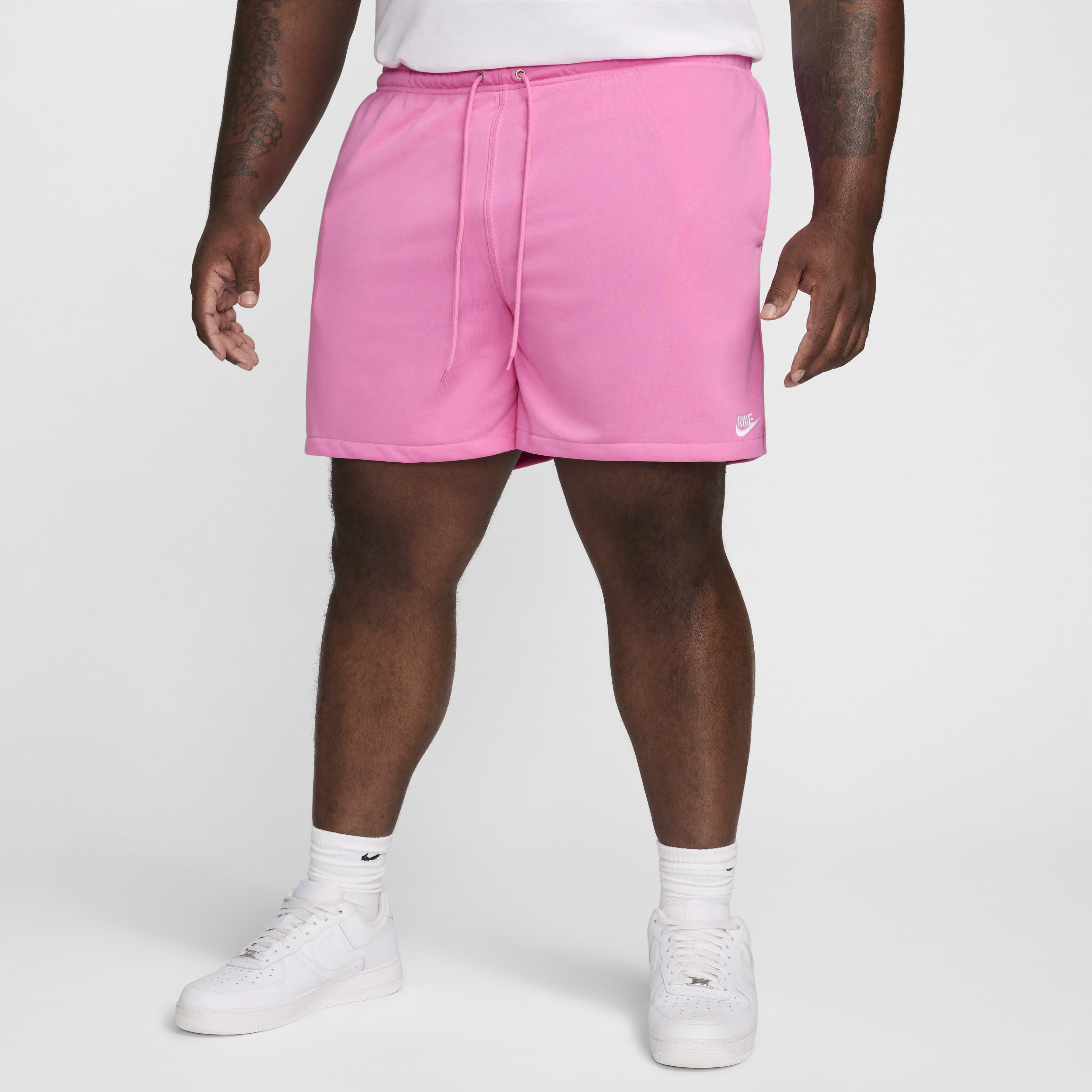 Mens pink shorts nike best sale