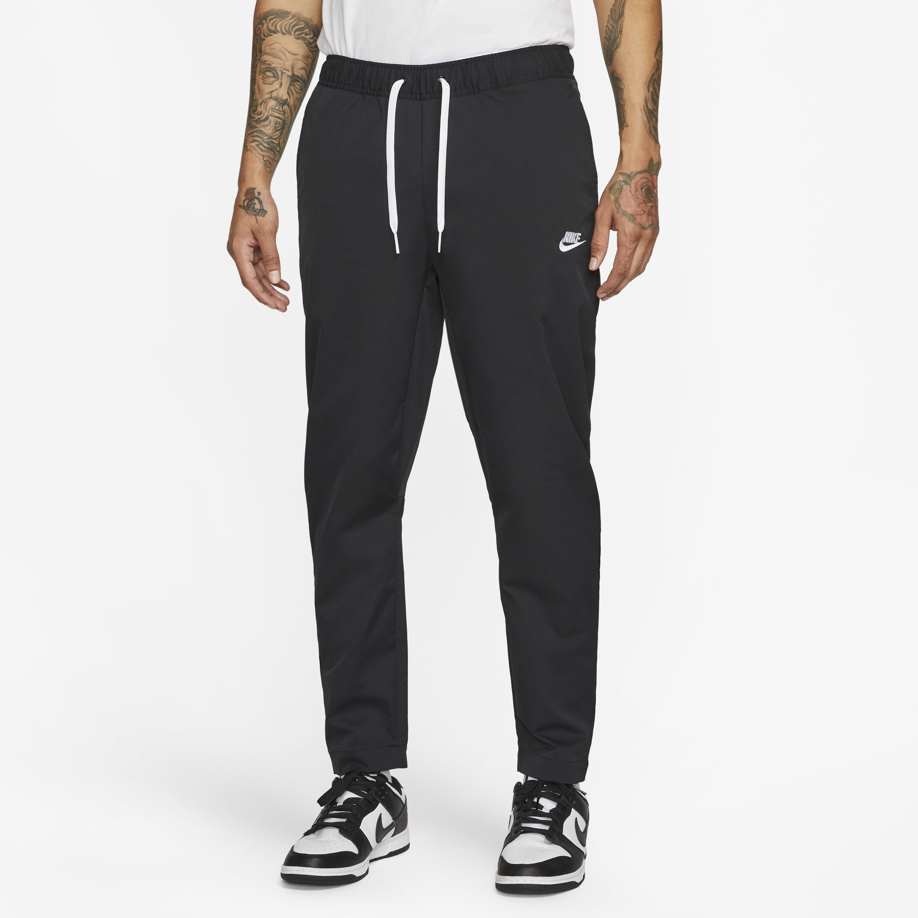 Buy Nike Club Men s Woven Tapered Leg Trousers Nike Qatar Official