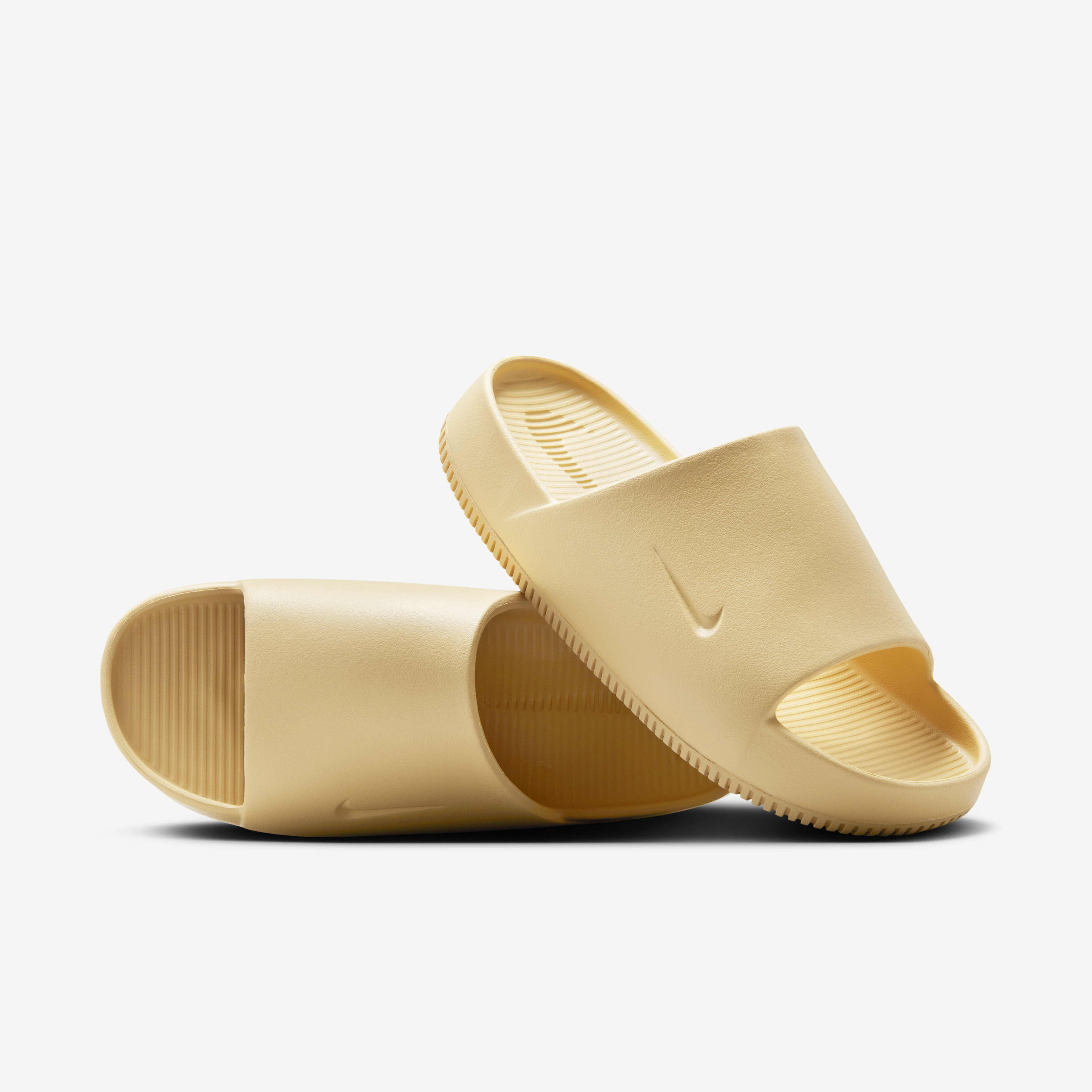Gold swoosh nike slides hotsell