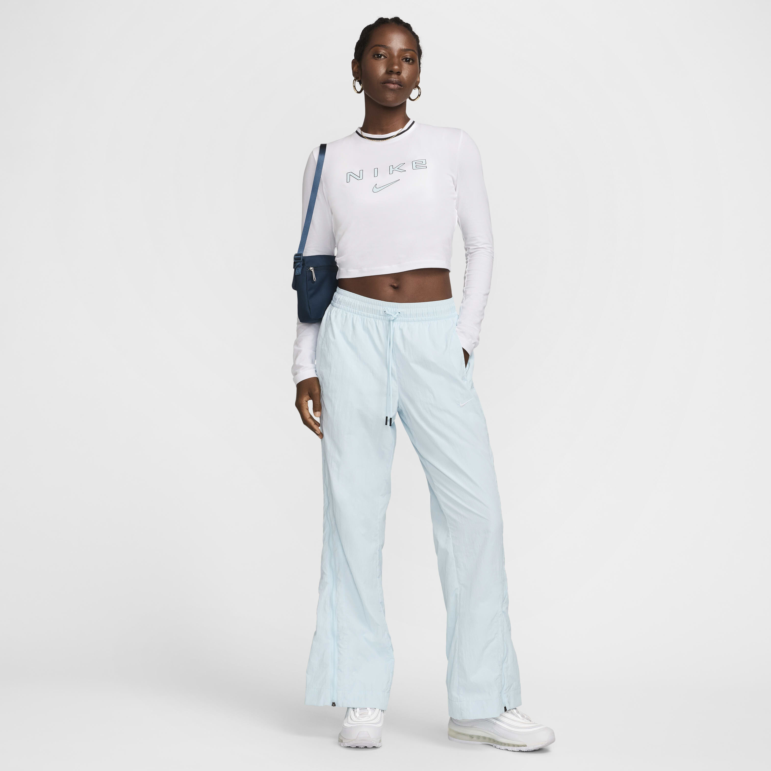 Buy Nike Sportswear Chill Knit Women s Slim Long Sleeve Cropped Graphic T Shirt Nike Qatar Official