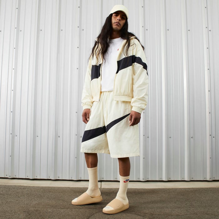 Buy Nike Calm Men's Slides Sesame/Sesame Nike Qatar