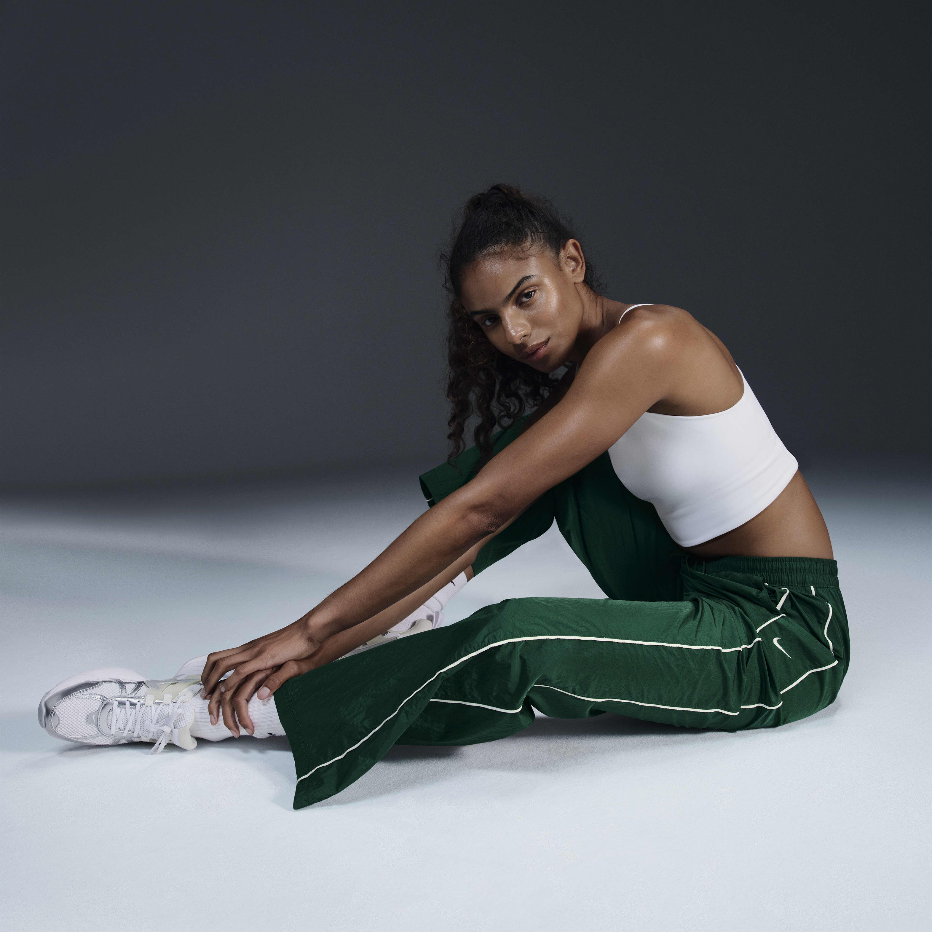 Buy Nike Windrunner Women s High Waisted Woven Open Hem Trousers Nike Qatar Official