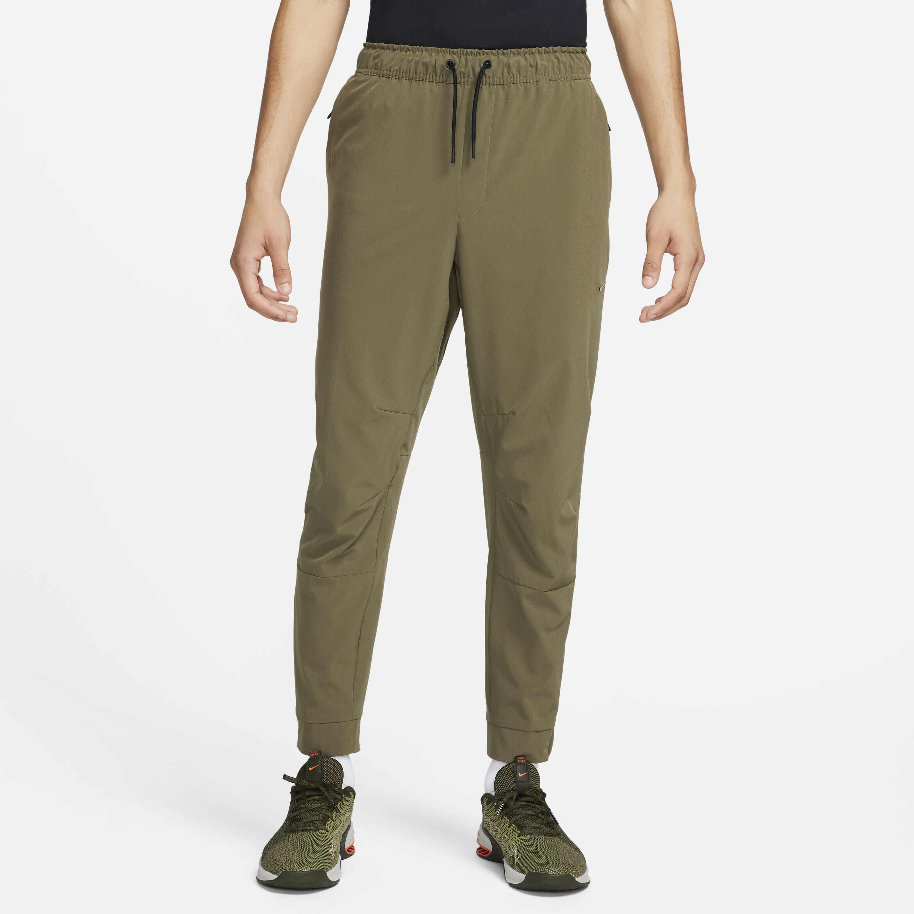 Buy Nike Unlimited Men s Dri FIT Zip Cuff Versatile Trousers Nike Qatar Official
