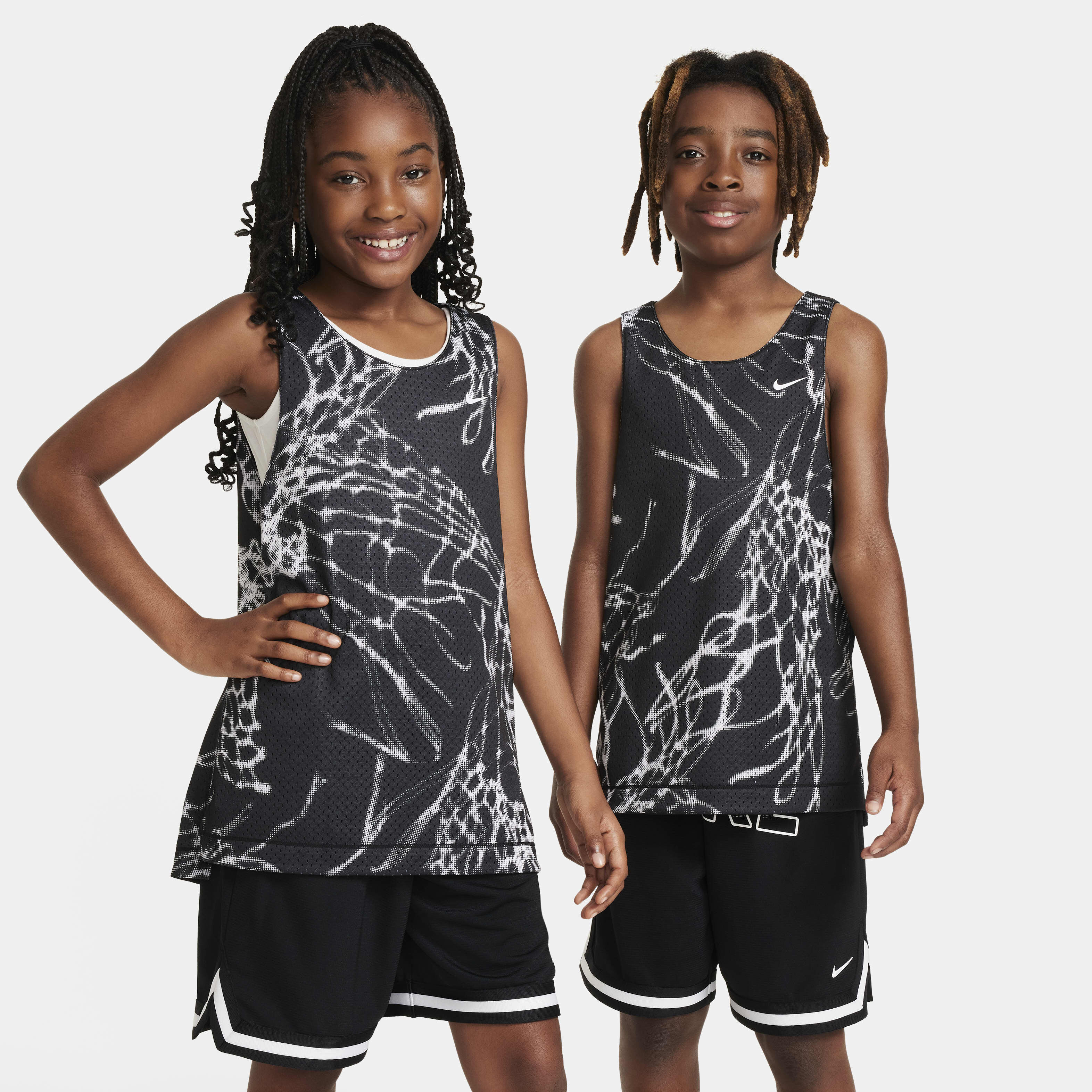 Buy Nike Culture of Basketball Older Kids' Reversible Jersey -  Black/Black/White | Nike Qatar Official
