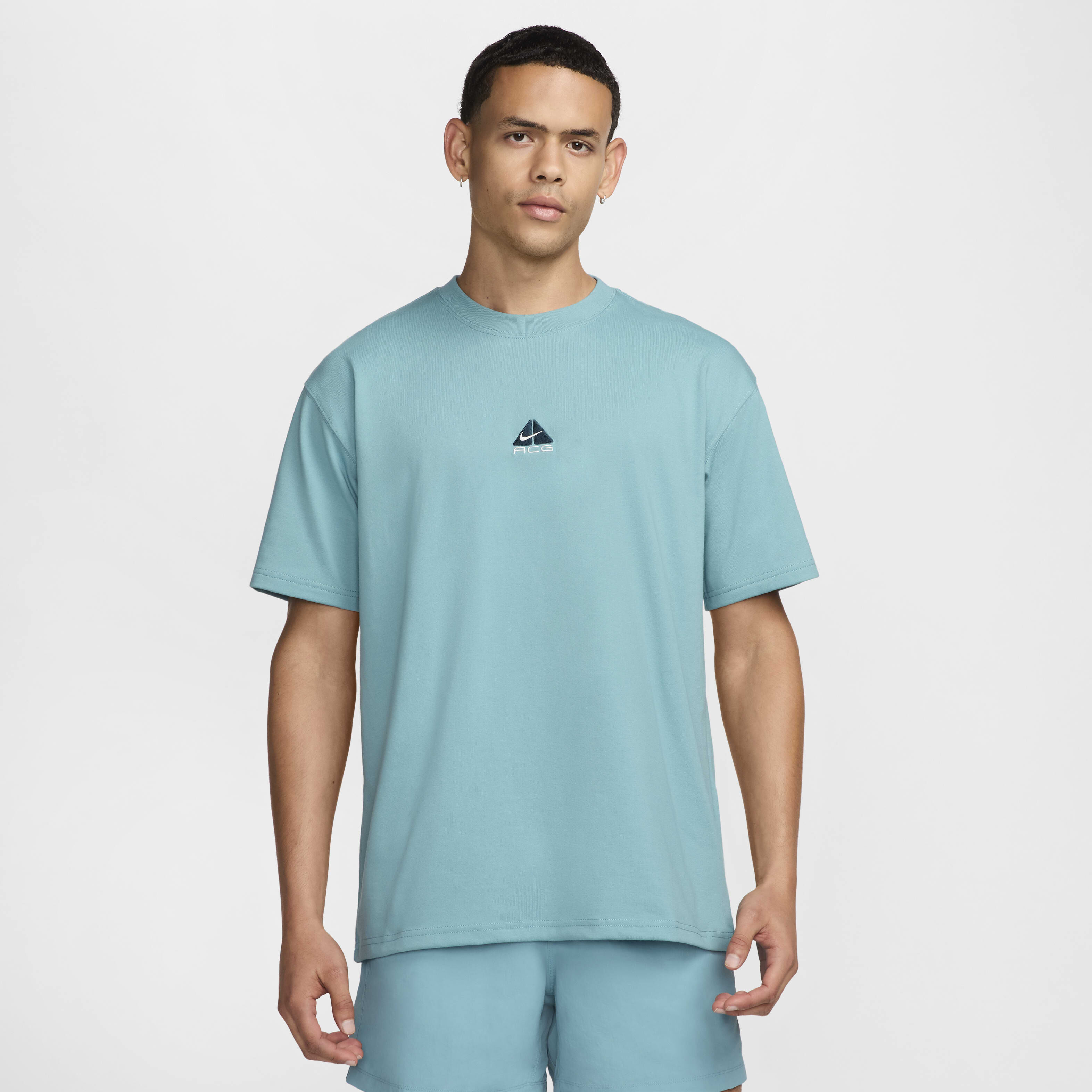 turquoise nike shirt