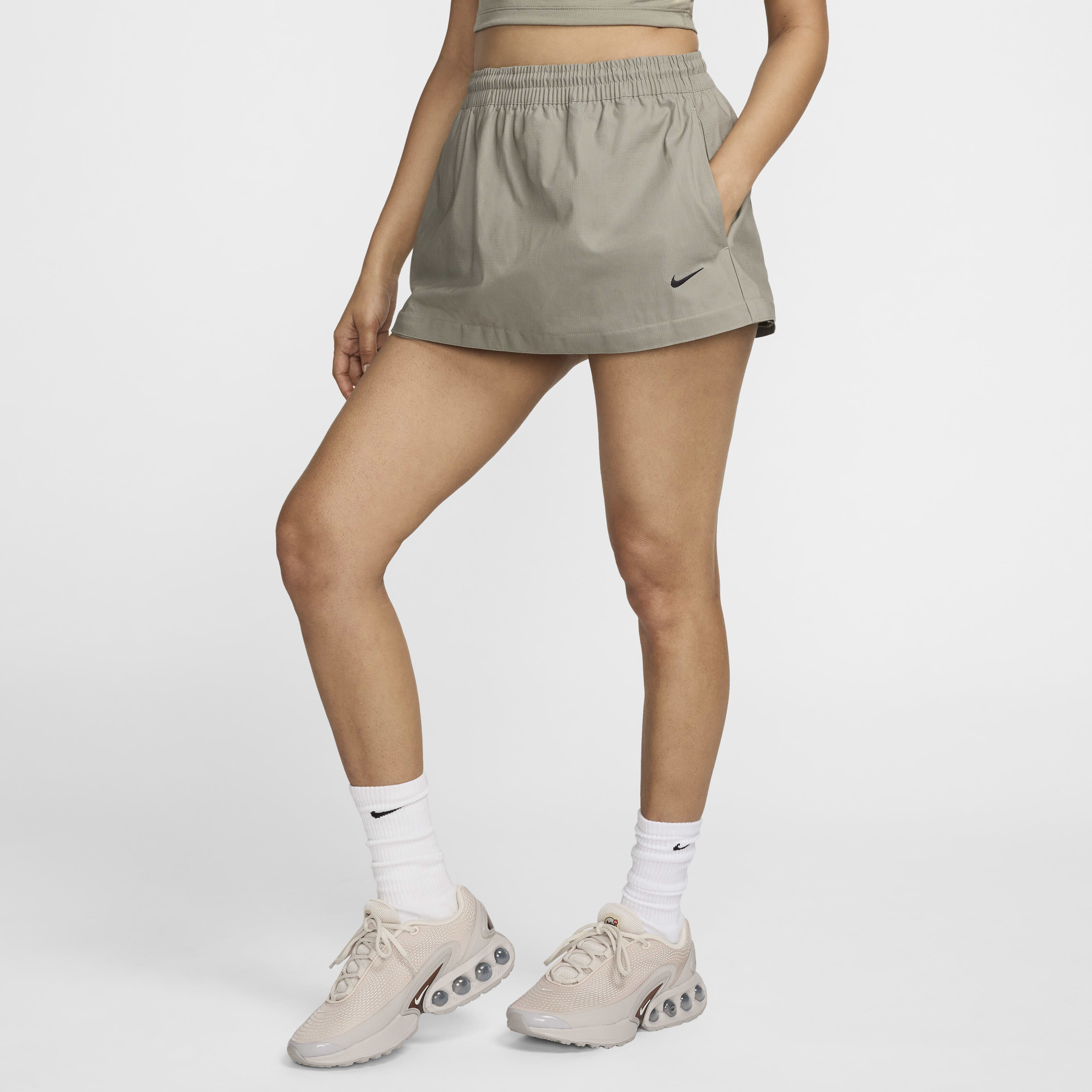 Buy Nike Sportswear Essential Women s Mid Rise Woven Cargo Midi Skirt Nike Qatar Official