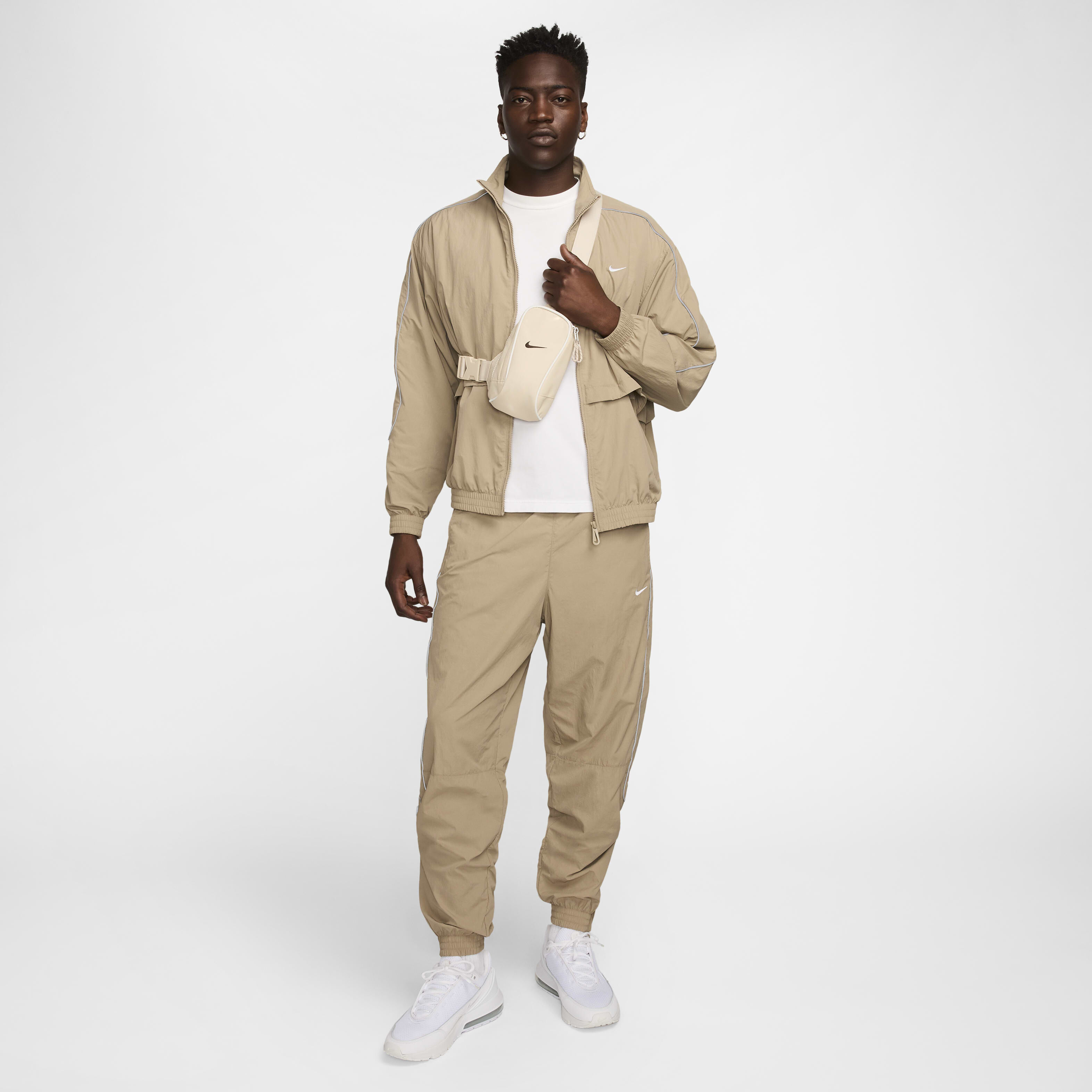 Nike beige tracksuit sales