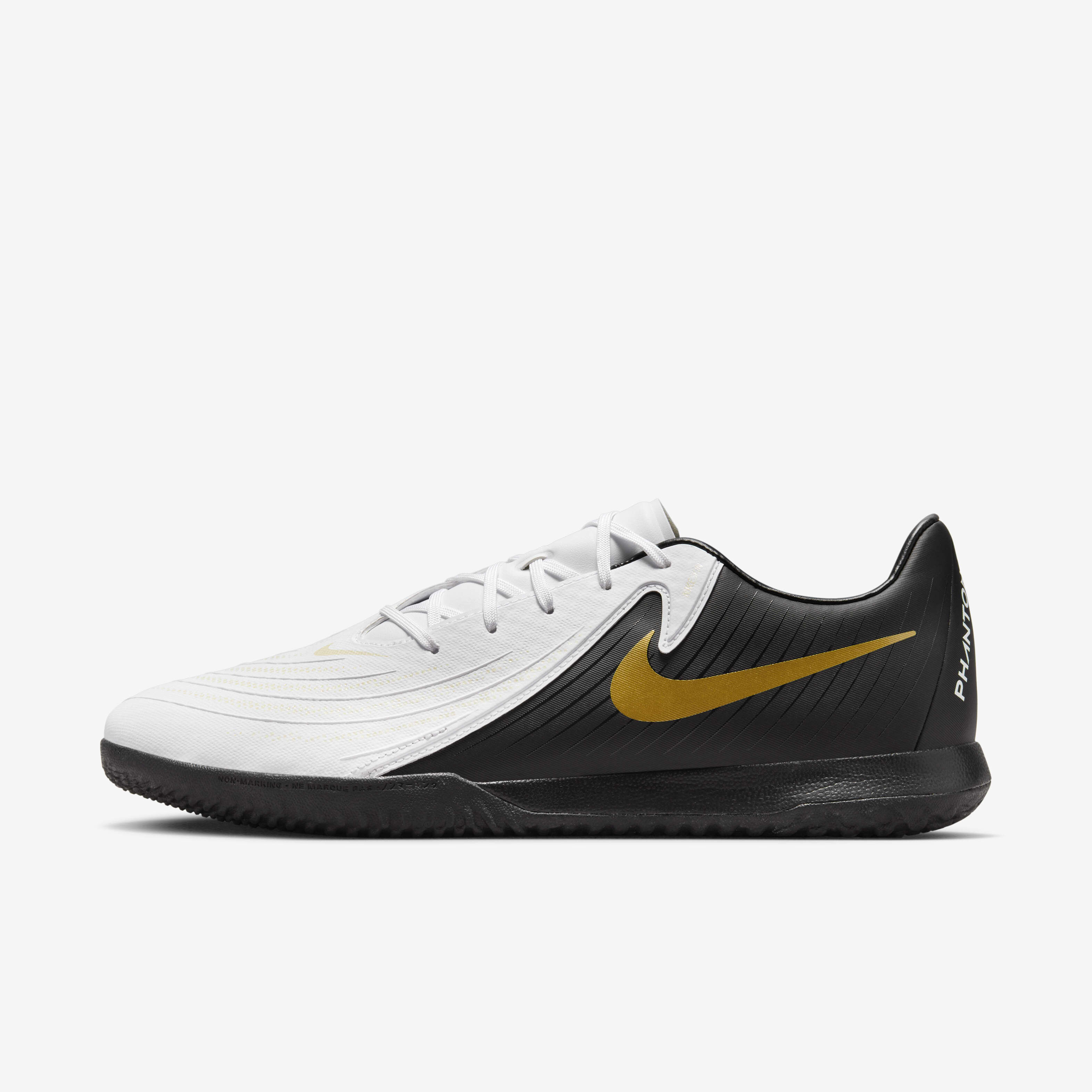 gold and black nike tennis shoes
