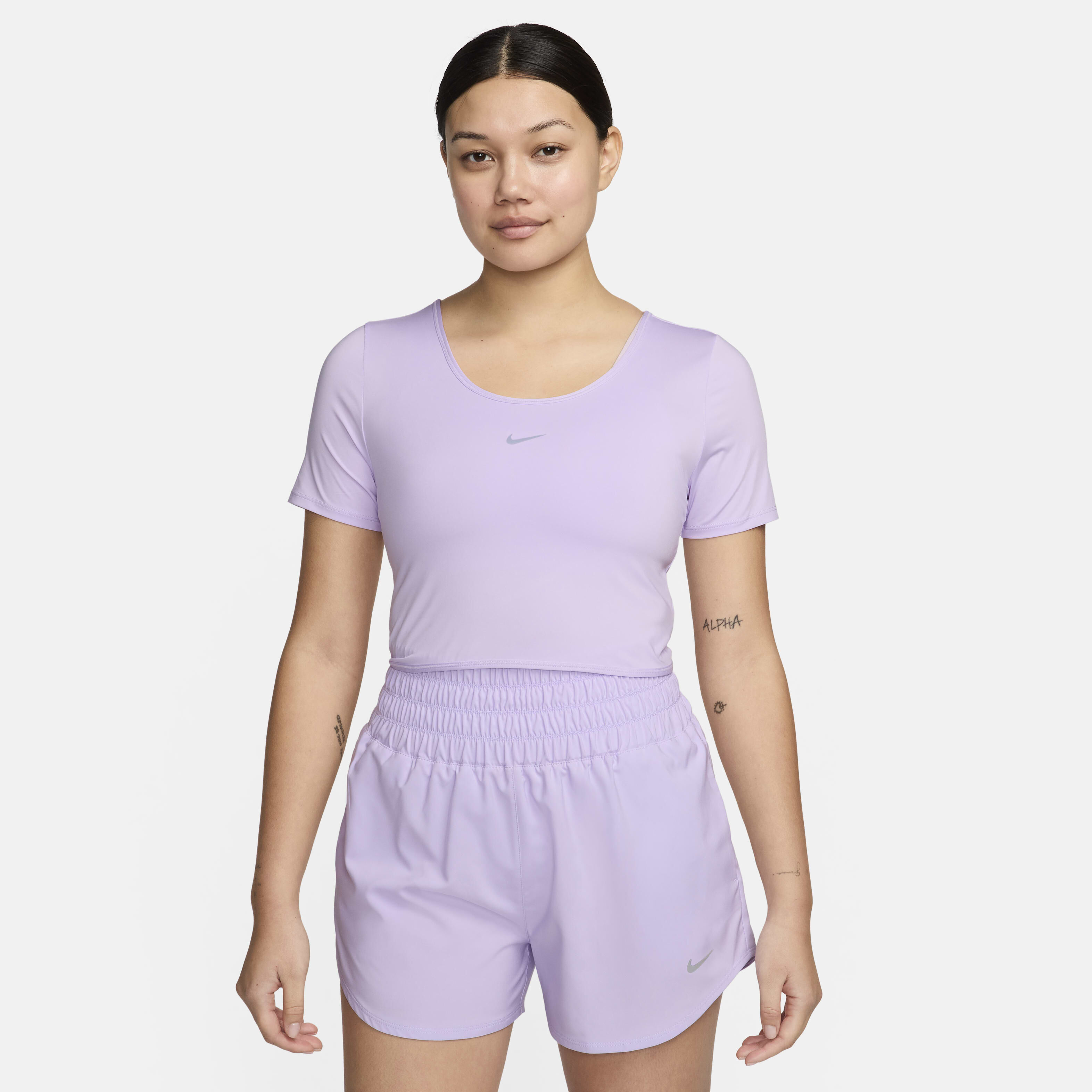 Buy Nike One Classic Women s Dri FIT Short Sleeve Cropped Twist Top Nike Qatar Official