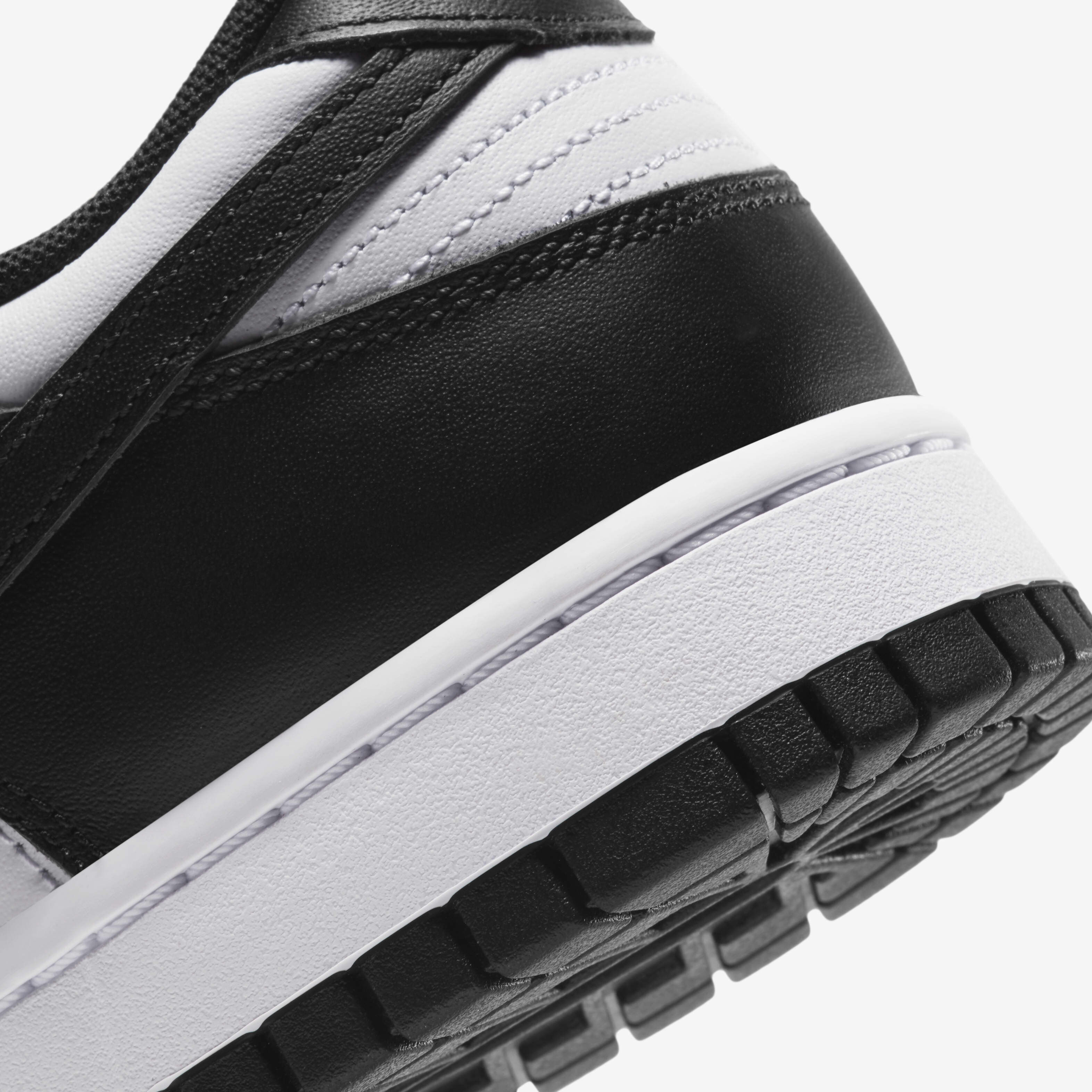 Buy Nike Dunk Low Retro Men's Shoe - White/White/Black