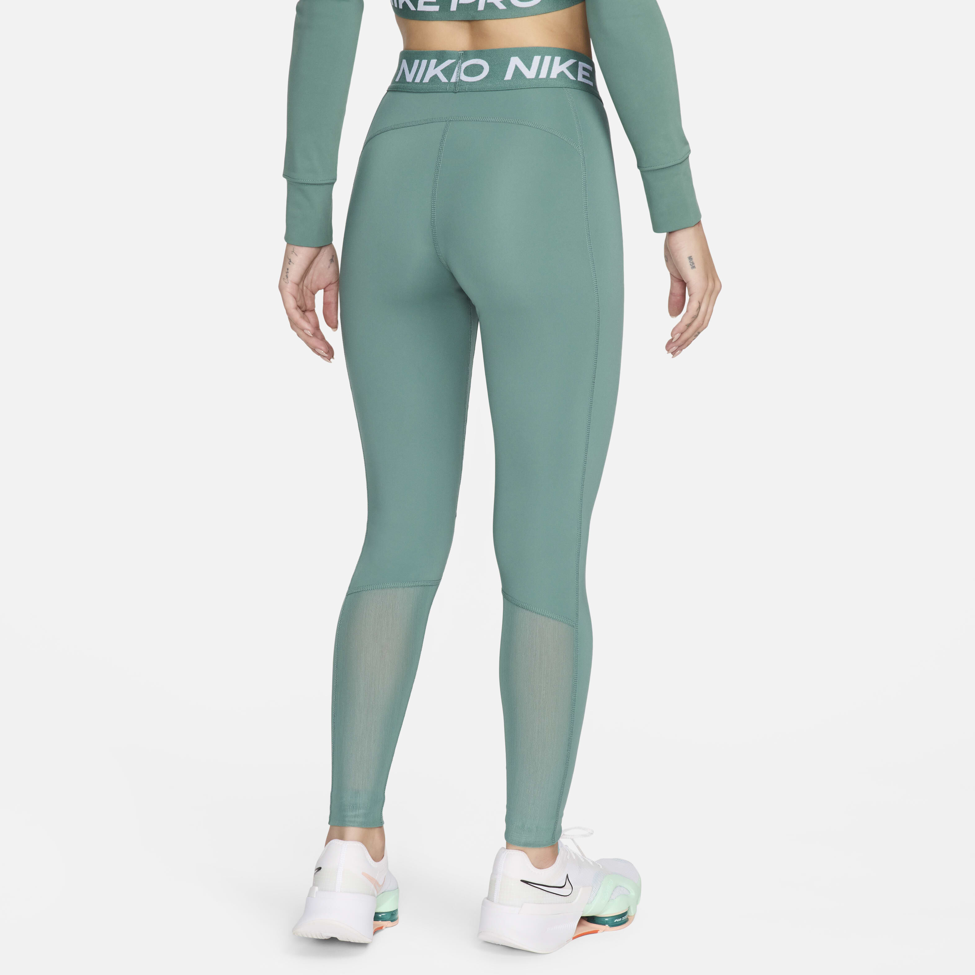 Buy Nike Pro Women s Mid Rise Mesh Panelled Leggings Nike Qatar Official