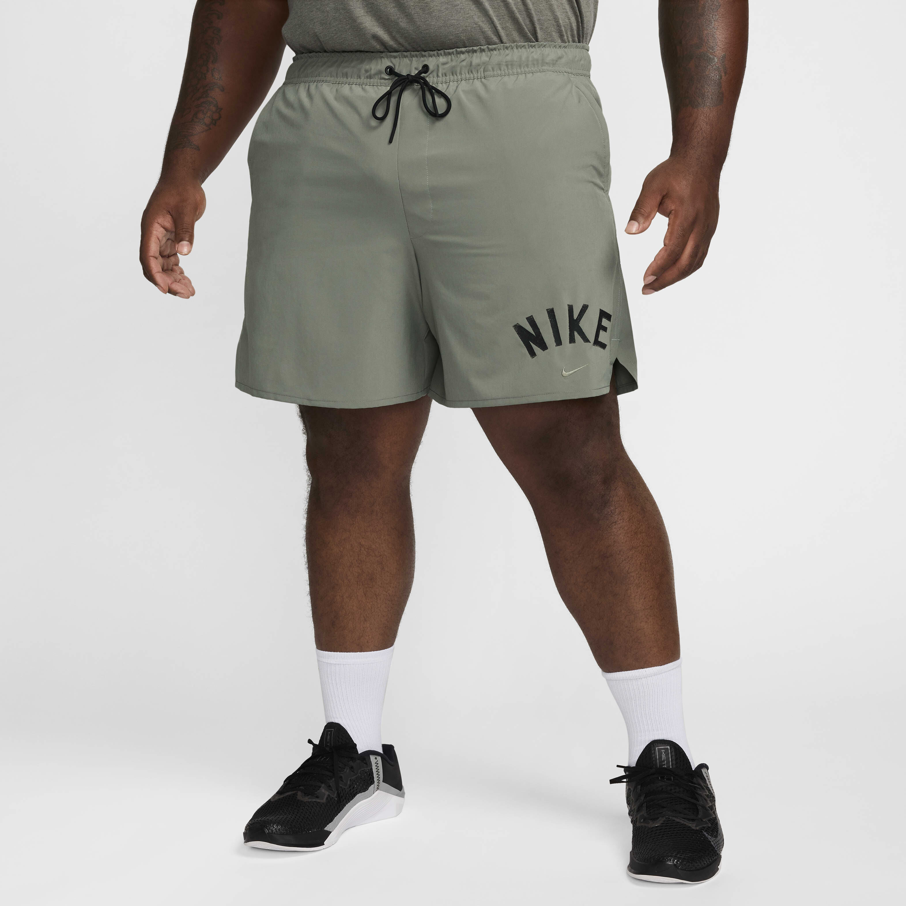 Buy Nike Unlimited Swoosh Men s 18cm approx. Dri FIT Unlined Versatile Shorts Nike Qatar Official